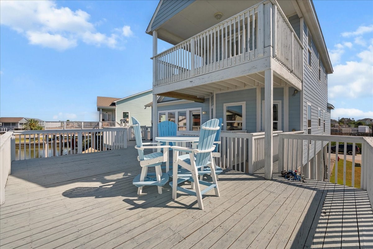 Enjoy an expansive deck, private boathouse, covered parking beneath the home, additional garage space, and exceptional outdoor livingall just a short walk from the neighborhood park.