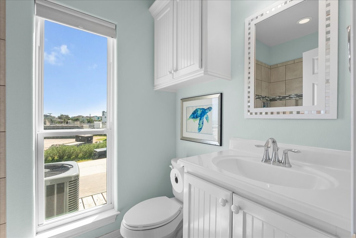 Full bath #1, conveniently located on the first floor, features a spacious walk-in shower.