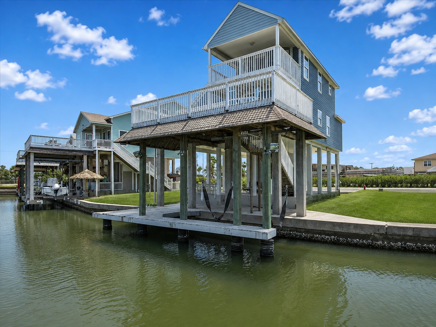 Experience elevated waterfront living in Tiki Island! This immaculately maintained coastal retreat welcomes you