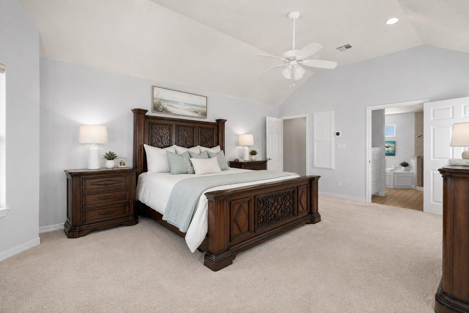 On the second floor, the private primary retreat offers its own waterfront balcony and spa-inspired en-suite with soaking tub, walk-in shower, dual sinks, and walk-in closet.