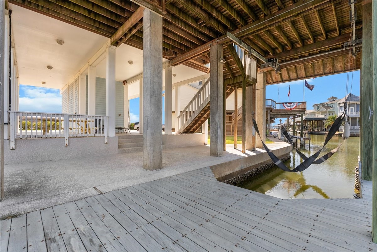 The private boathouse and expansive outdoor living space create the perfect setting for relaxing, entertaining, and enjoying the Tiki Island waterfront lifestyle.