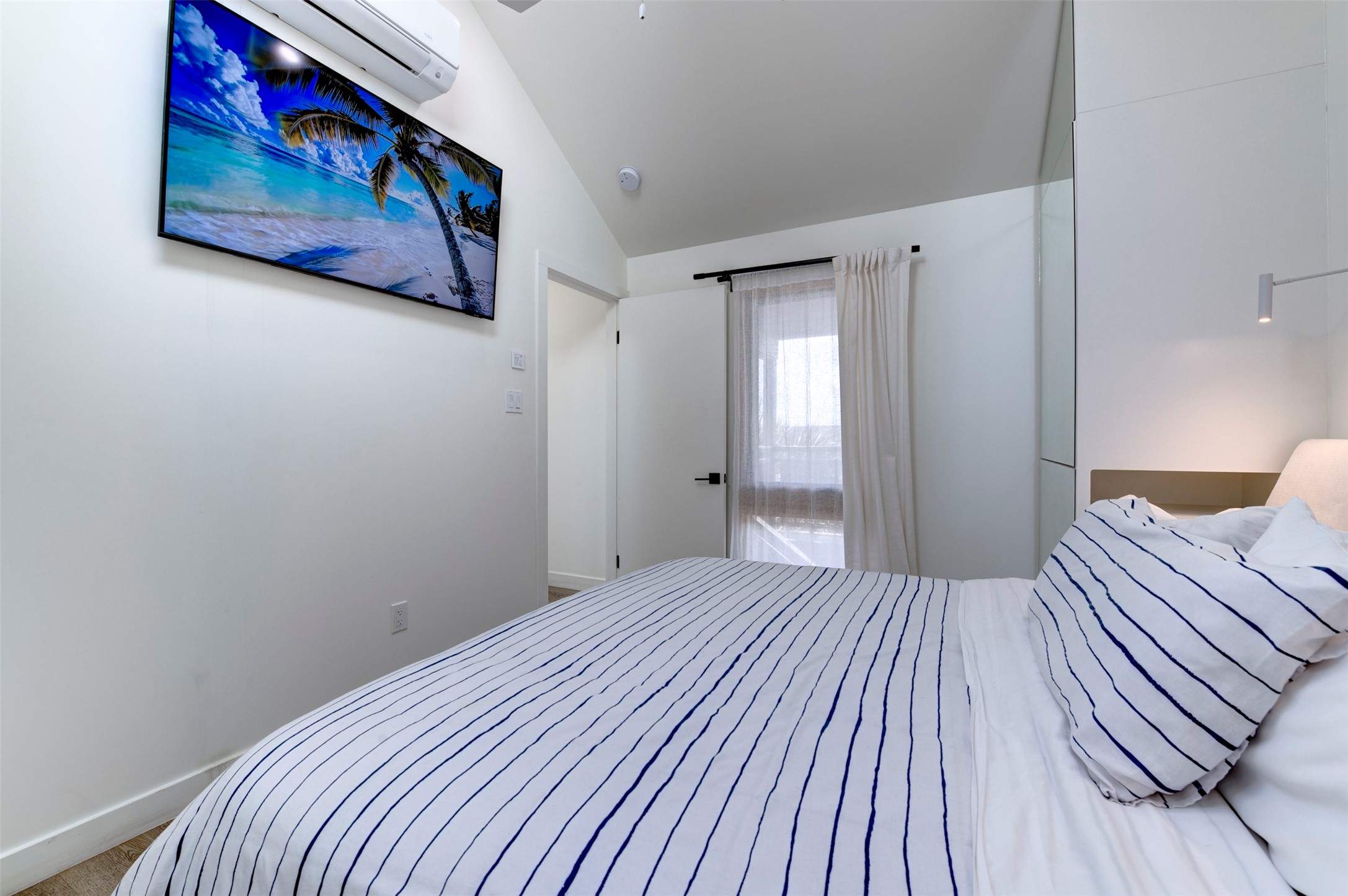 Front house primary king bedroom with built-in wardrobes