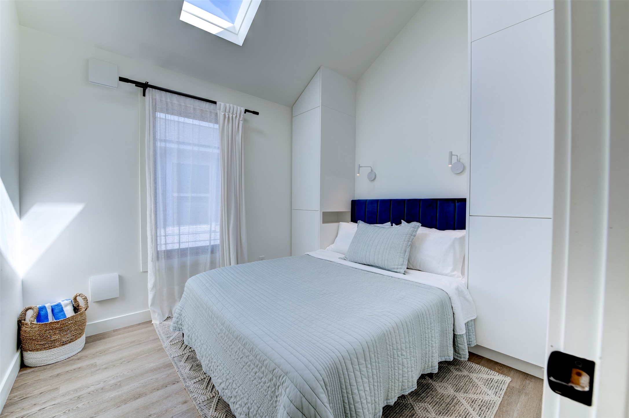 Front house Queen bedroom with built-in wardrobes and skylight