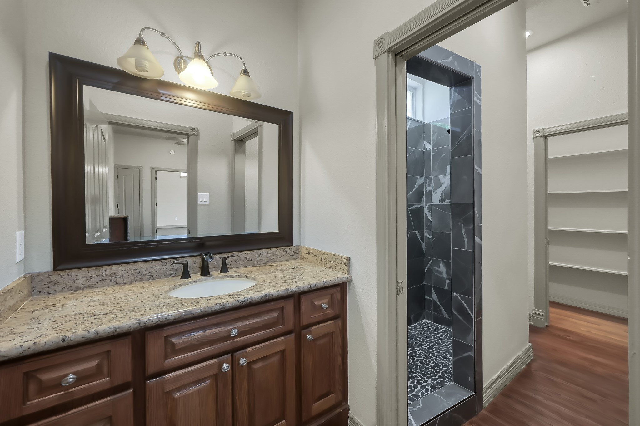 Fourth Bathroom with Walk in Shower is off the Media Room