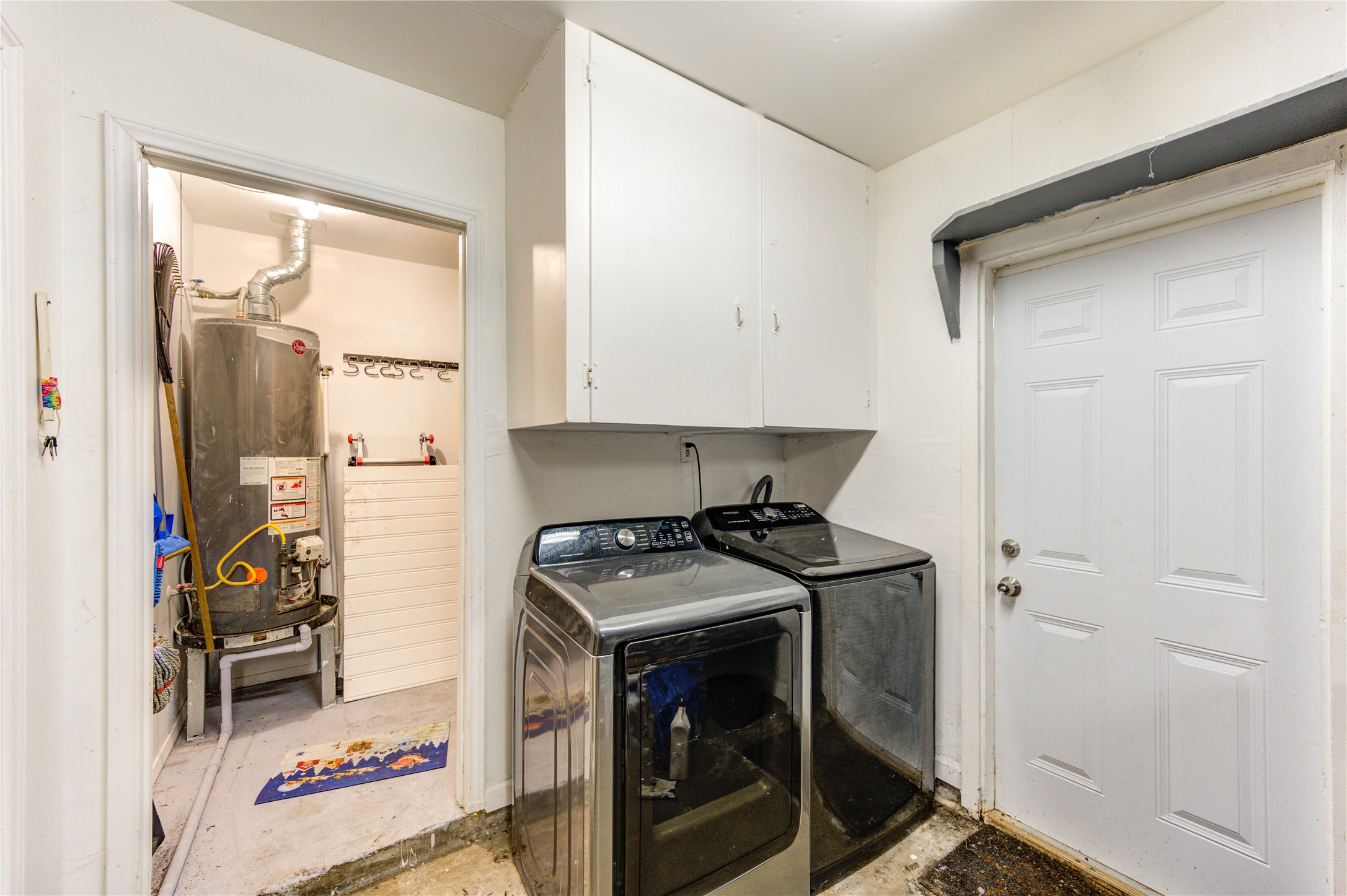 A view of the laundry and utility area in the garage, just off the dining room.