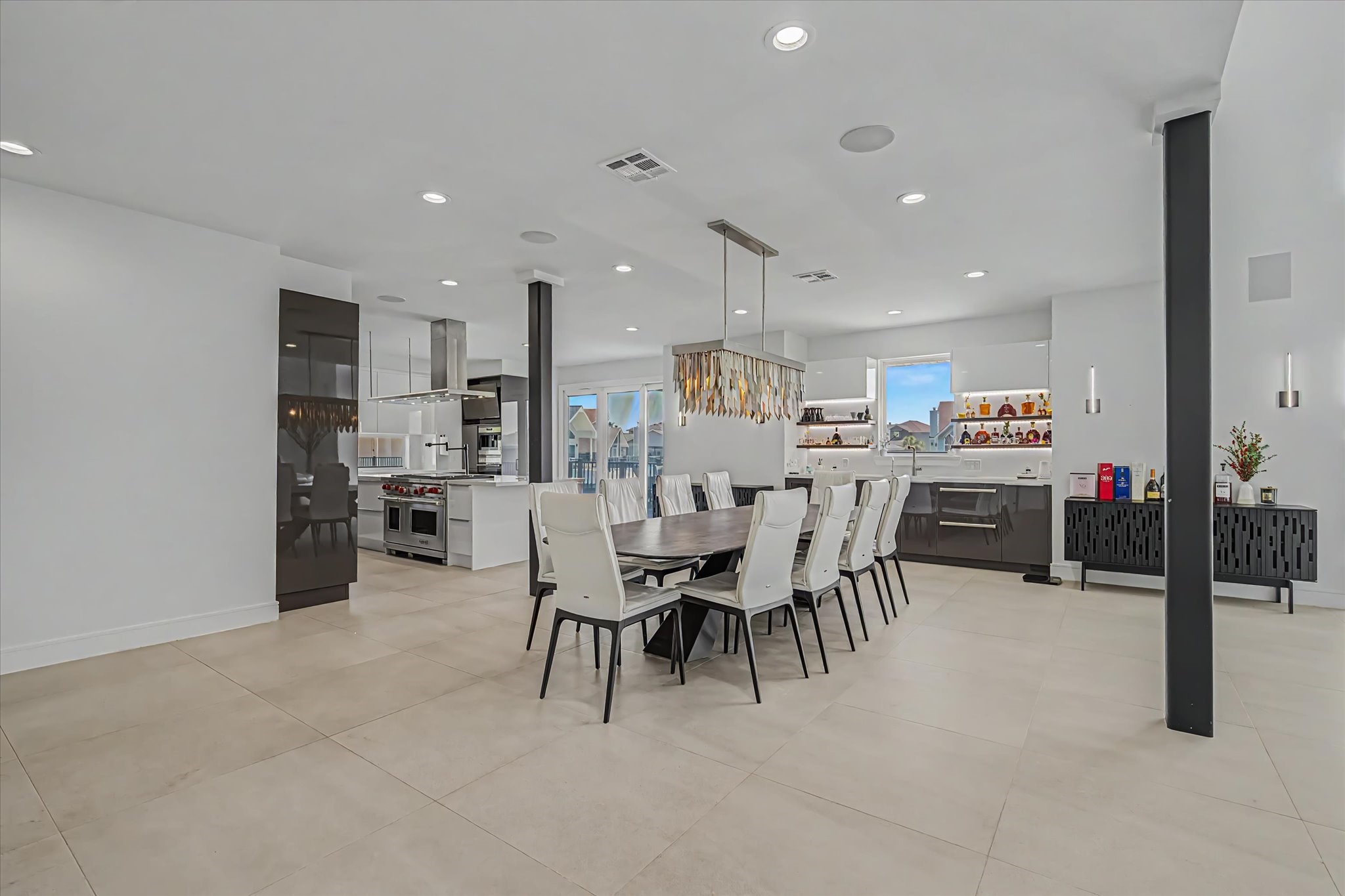 Open floorplan dining room connected with kitchen and living room