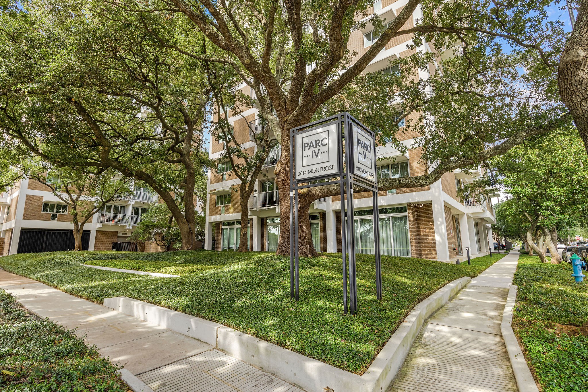 The Parc IV and V Mid Century condo complex is nestled among lush trees in the heart of Montrose. The Parc IV and V Mid Century condo complex is nestled among lush trees in the heart of Montrose.