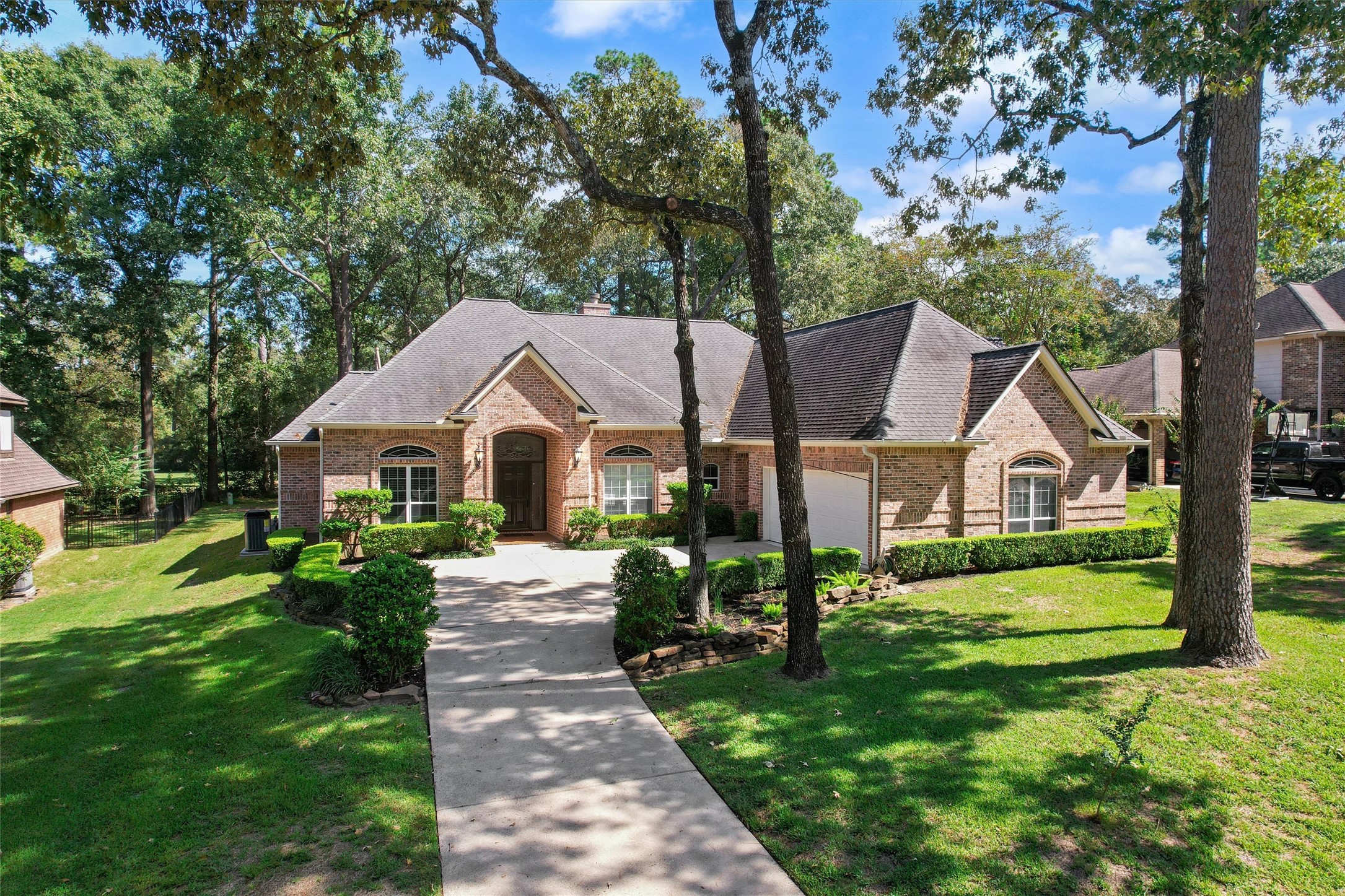 A tree-lined approach and curved drive with established landscaping creates inviting curb appeal. A tree-lined approach and curved drive with established landscaping creates inviting curb appeal.