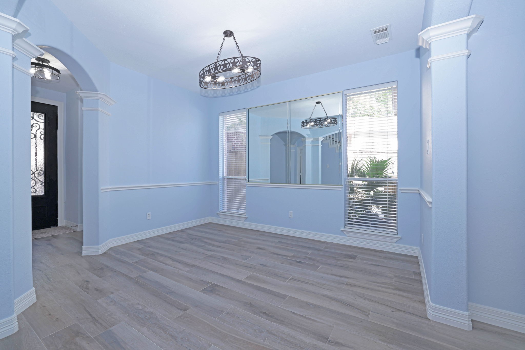 The formal dining room opens to the family room.