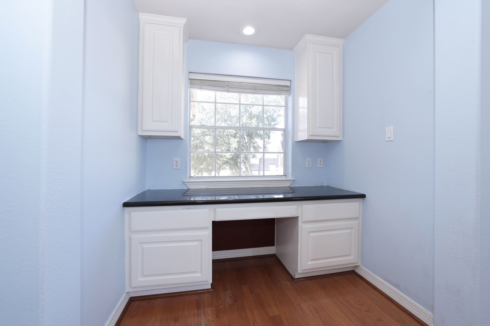 This is an office nook that is attached to the game room.