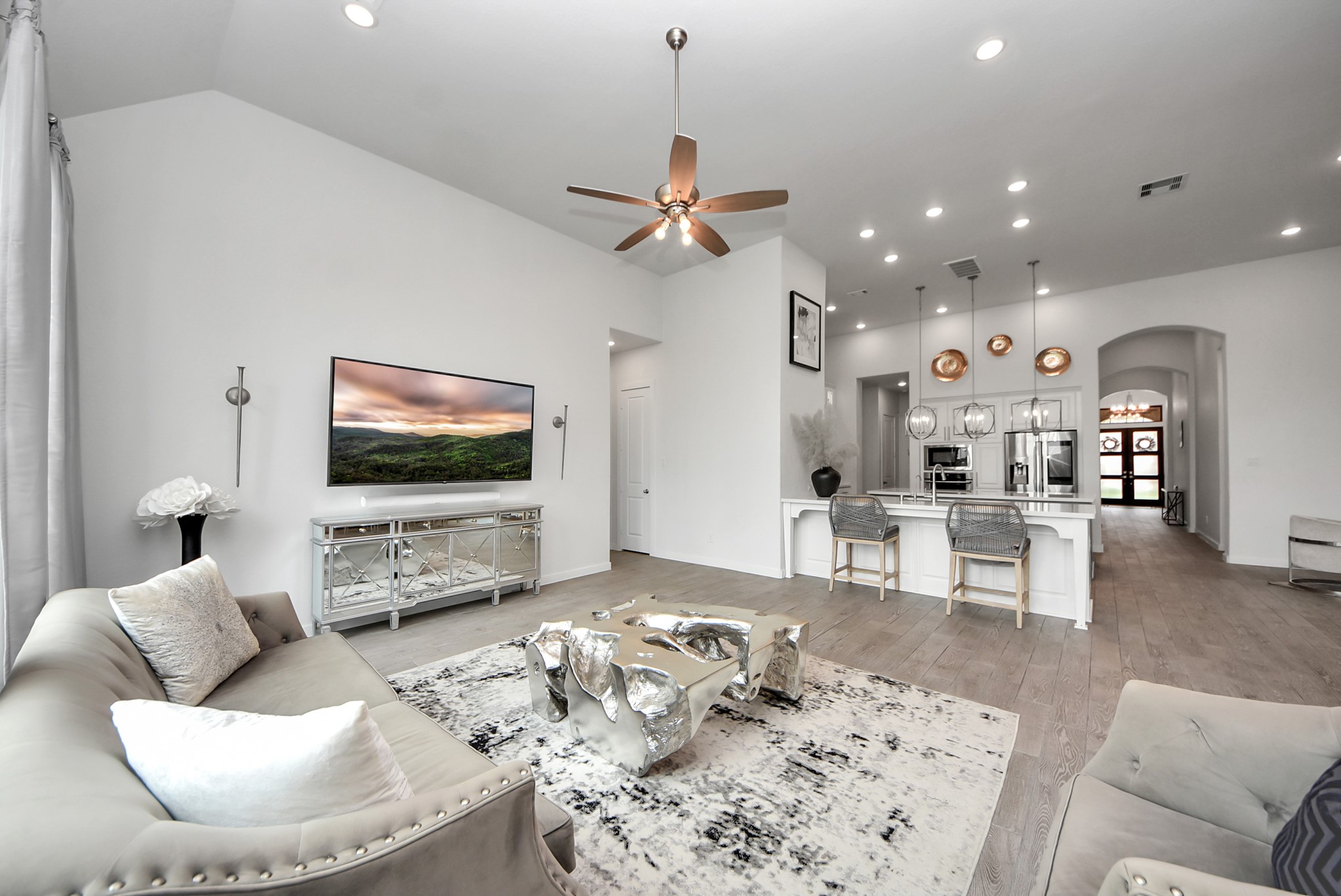 Spacious living room with high ceilings and an open layout ideal for entertaining.