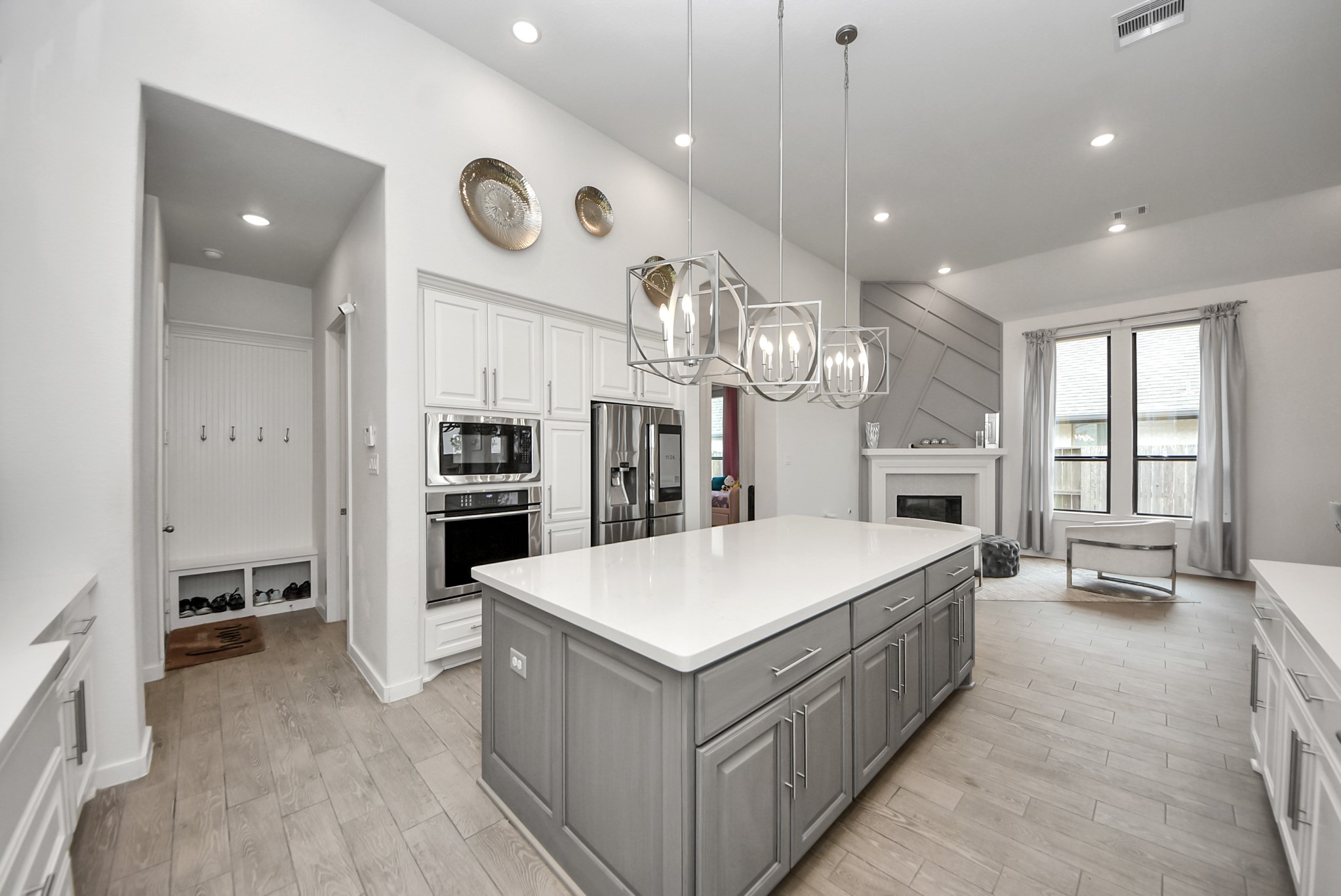 Gorgeous kitchen featuring a large center island, modern cabinetry, and pendant lighting.
