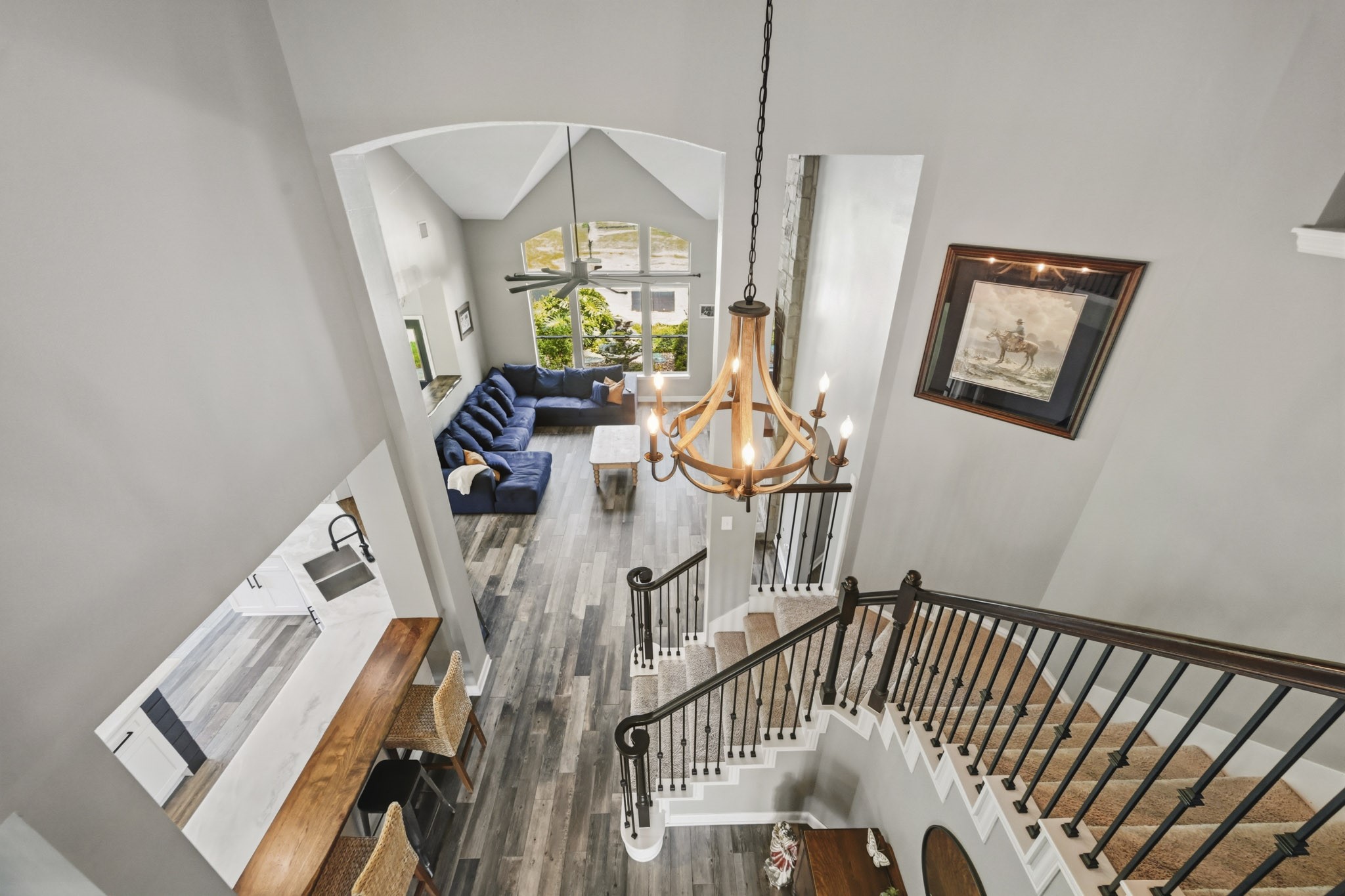 Open upstairs landing with views of the home's impressive architectural features.
