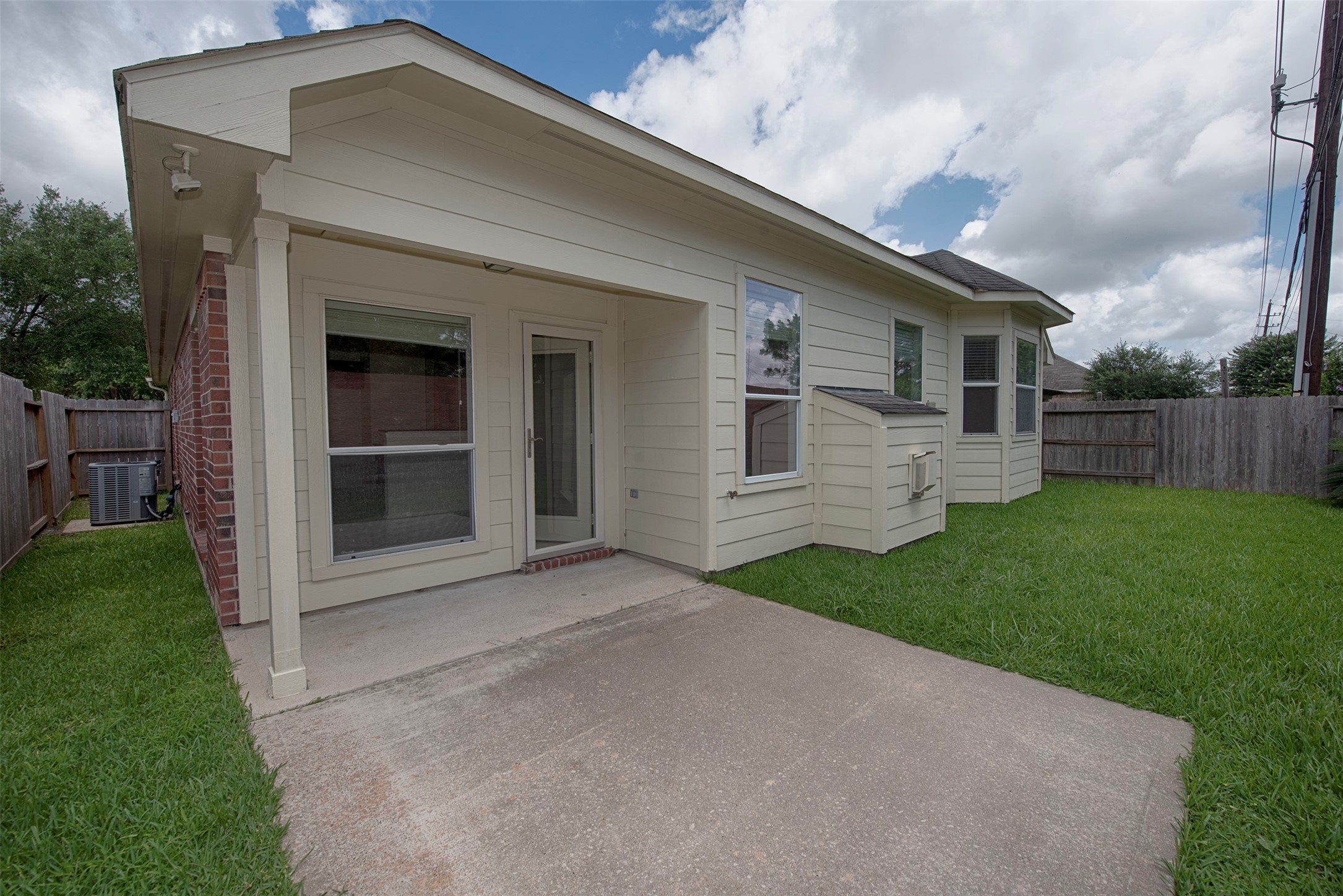 A view of the spacious back patio for outdoor entertaining.