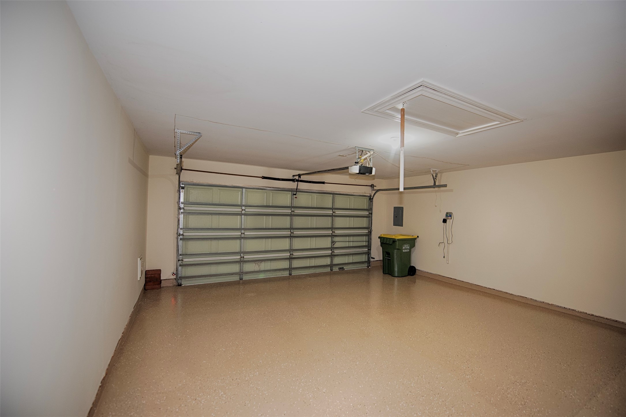 Garage updated with gorgeous epoxy floors.