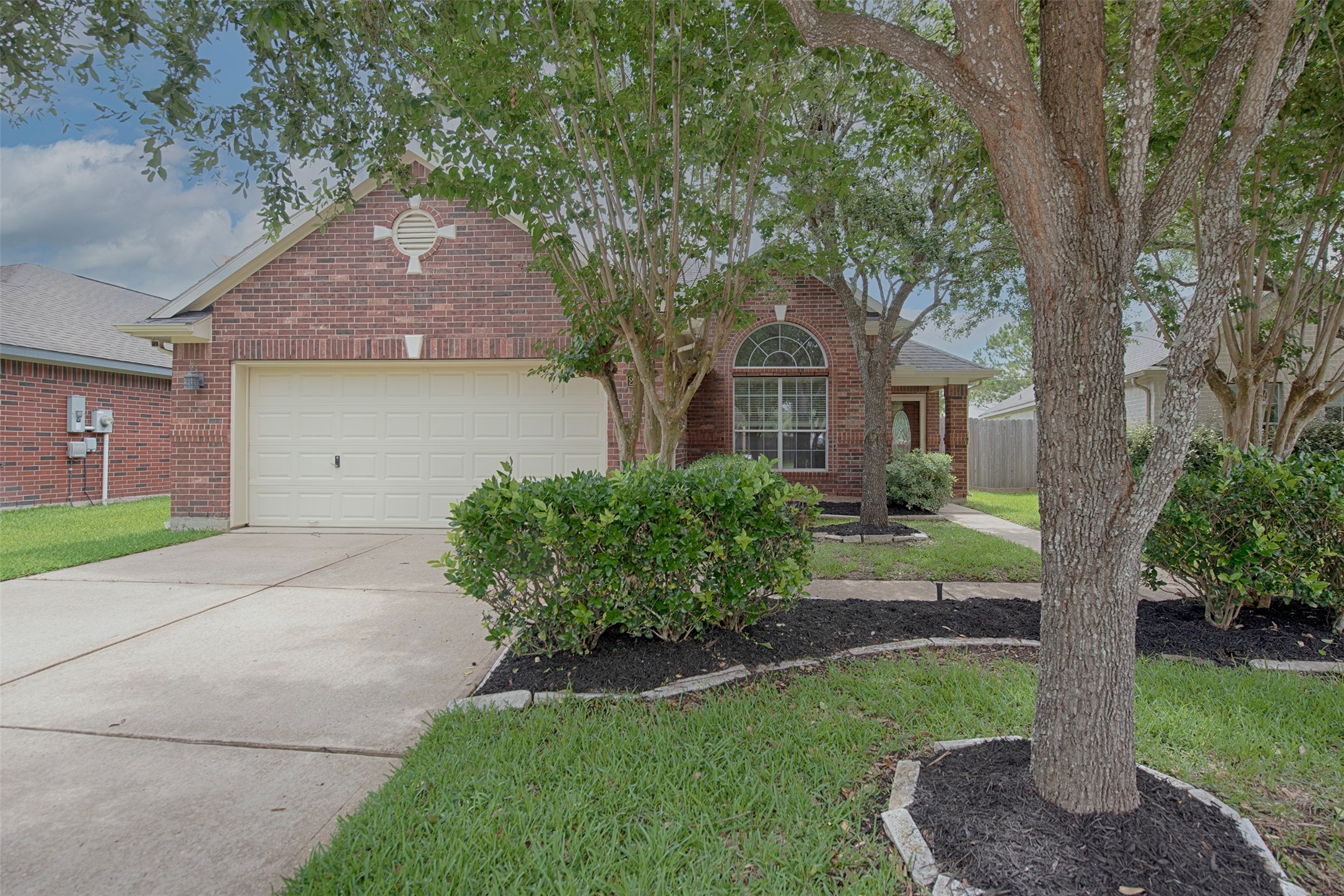 Amazing home in quiet neighborhood with breathtaking landscaping.