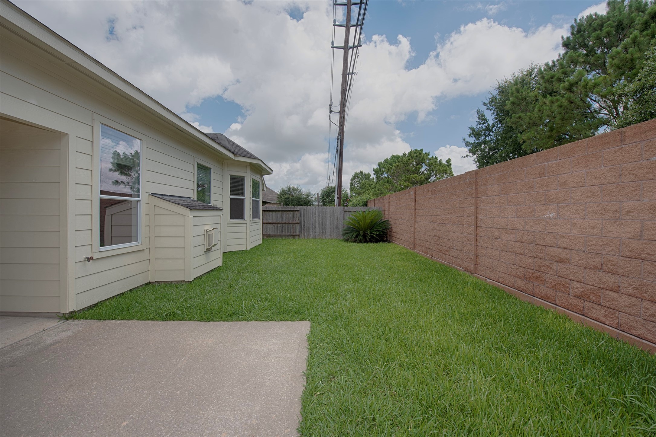 Great backyard for the kids to play or to toss a ball for the family dog.