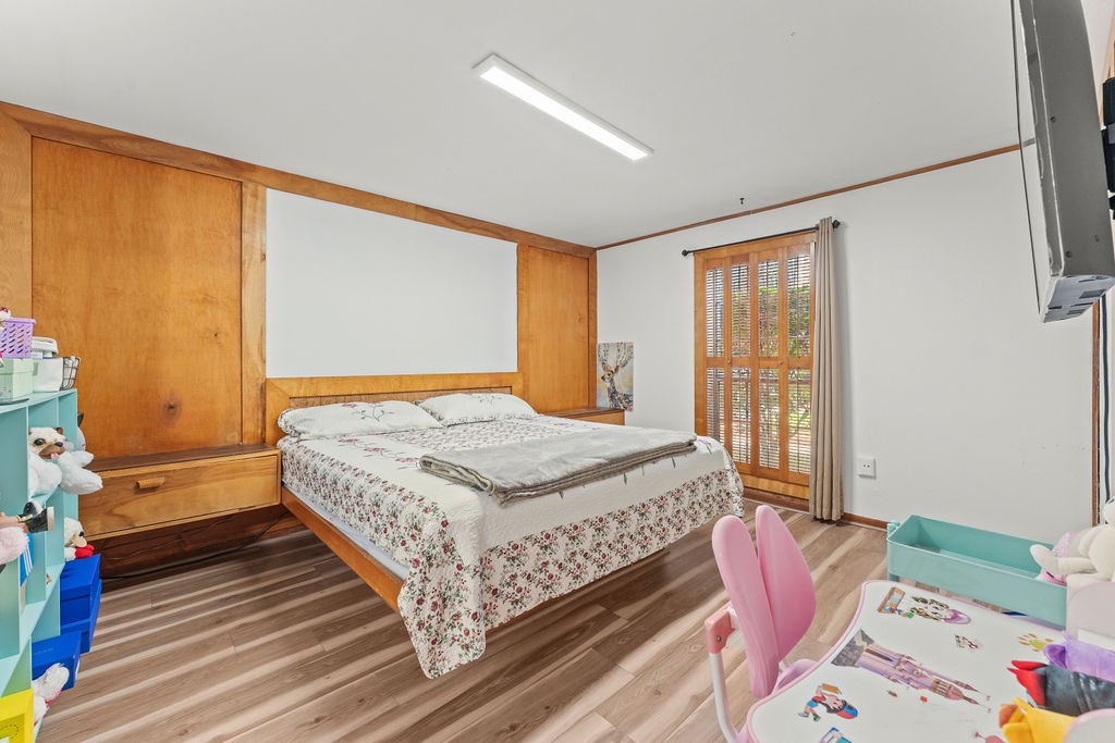 Oversized Primary Bedroom with new paint and flooring
