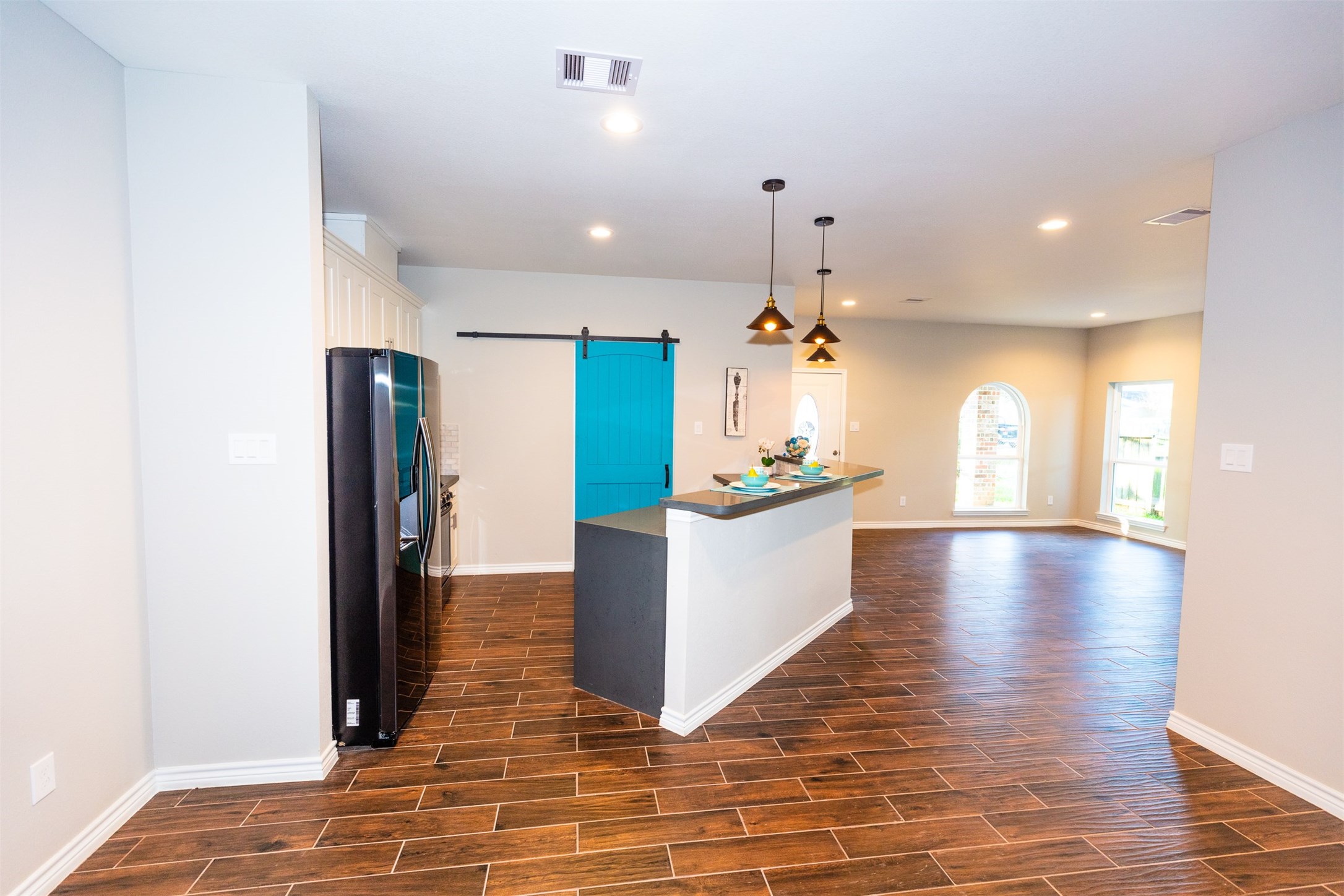 Ceramic tile floor throughout. (View from the dining room)
