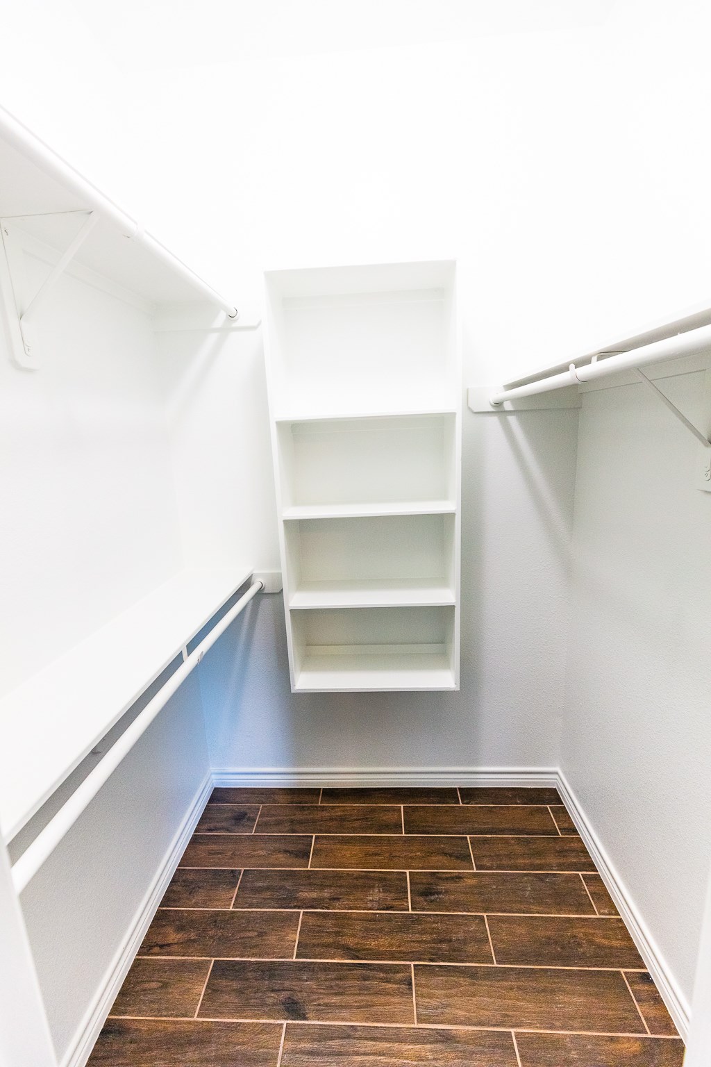 Walk in  Master closet with build in shelving.