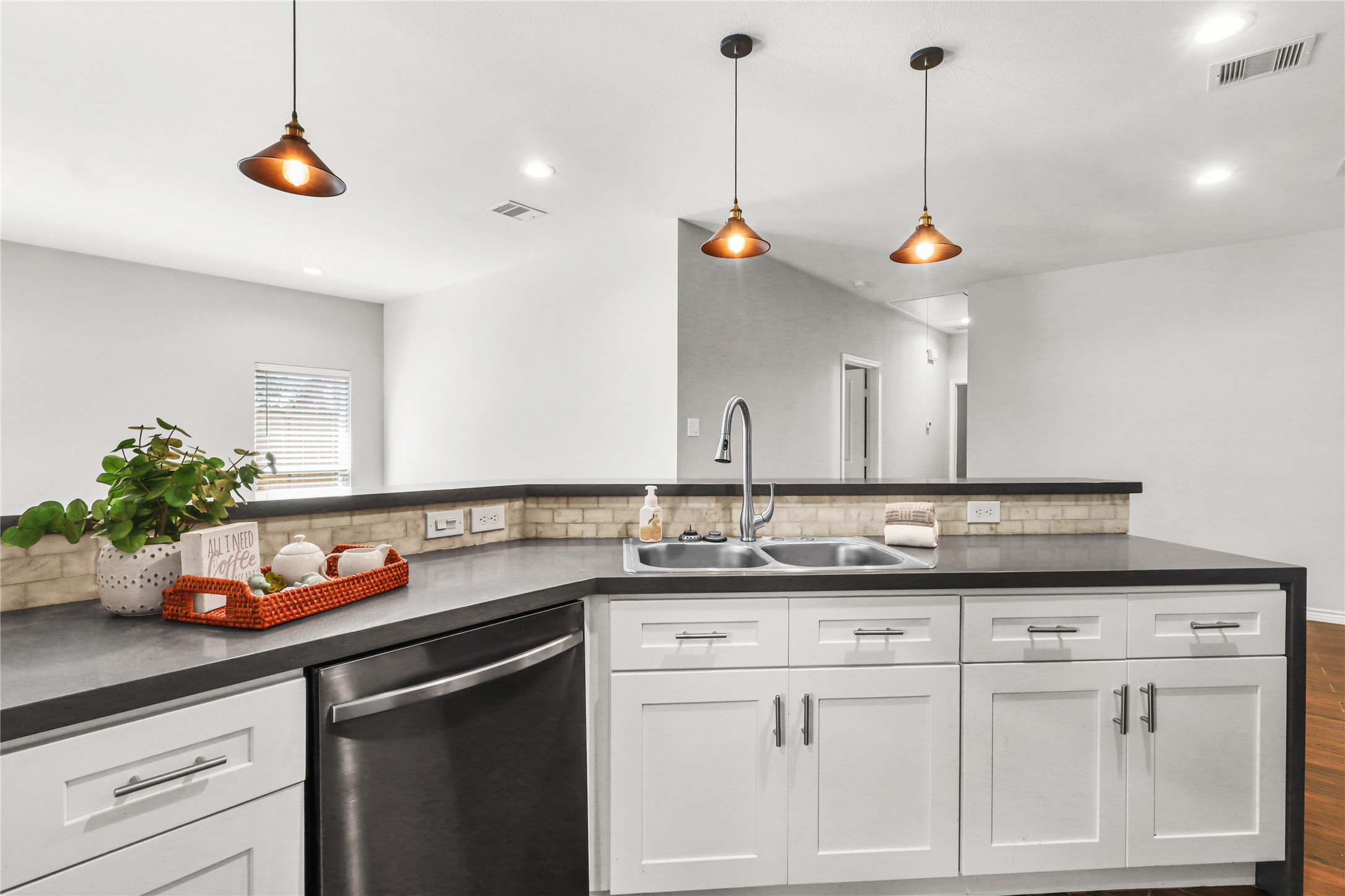 Soft close white cabinets and Quarts counter tops