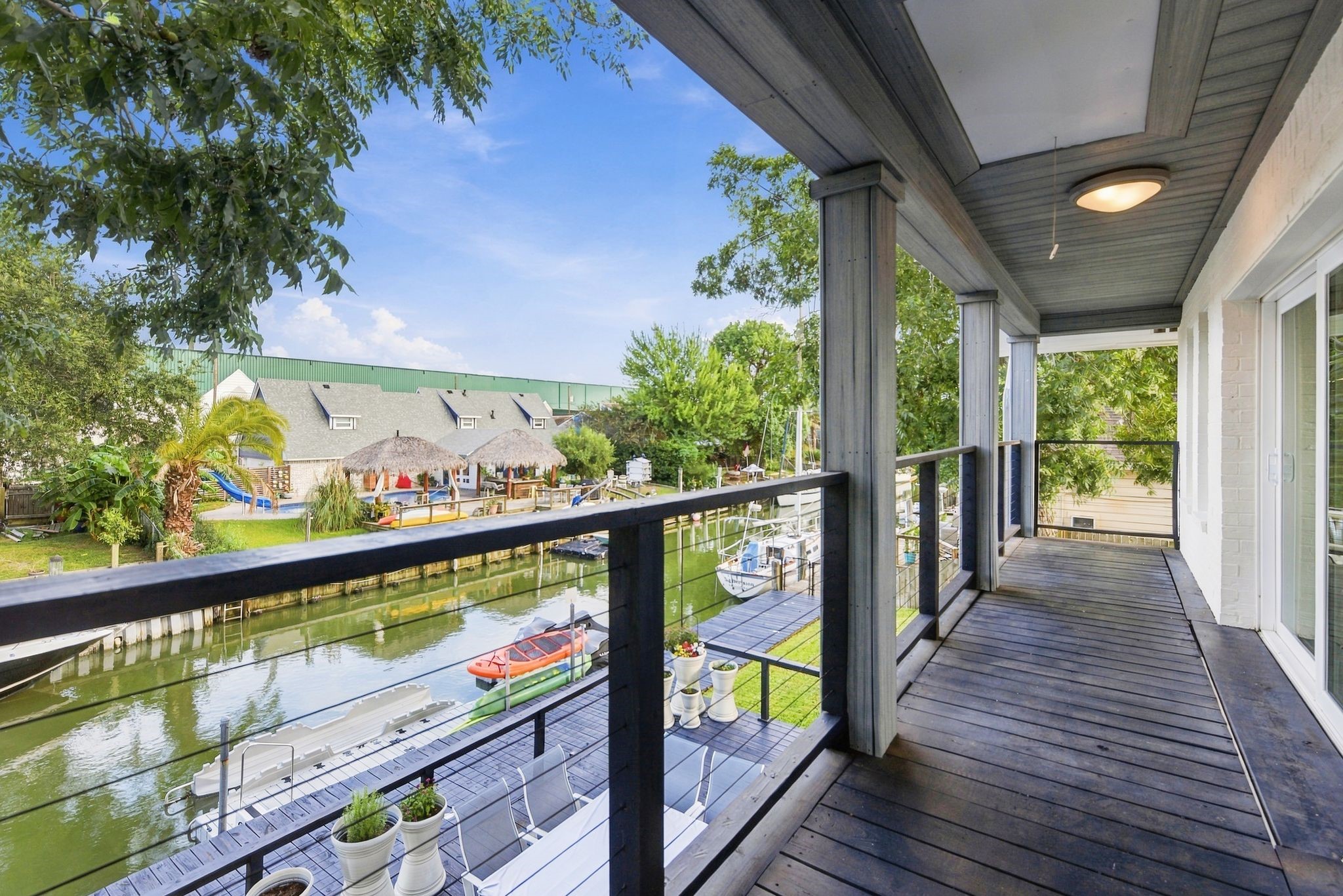 The upstairs gameroom leads to an outside covered porch.