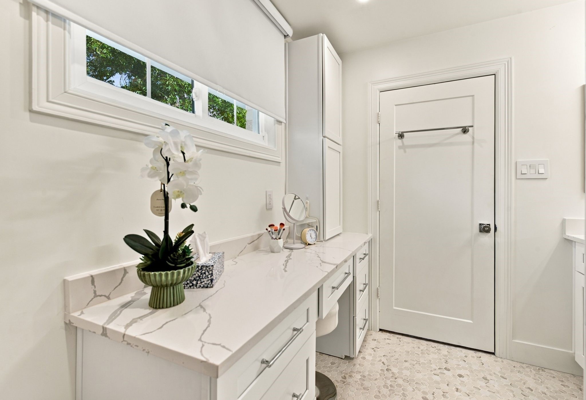 The primary restroom has a seperate vanity area.