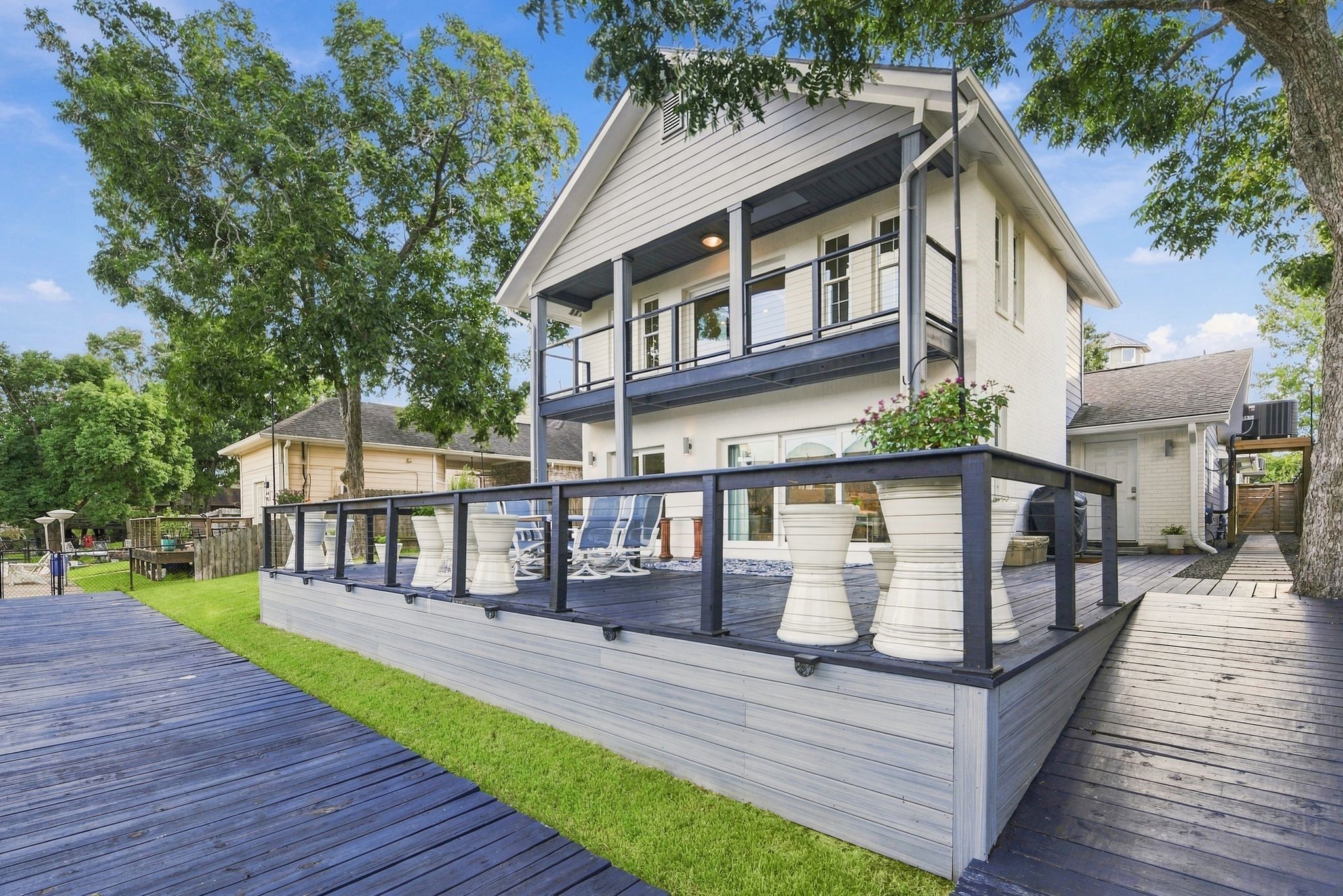 This inviting back porch is calling for your entertaining guests.