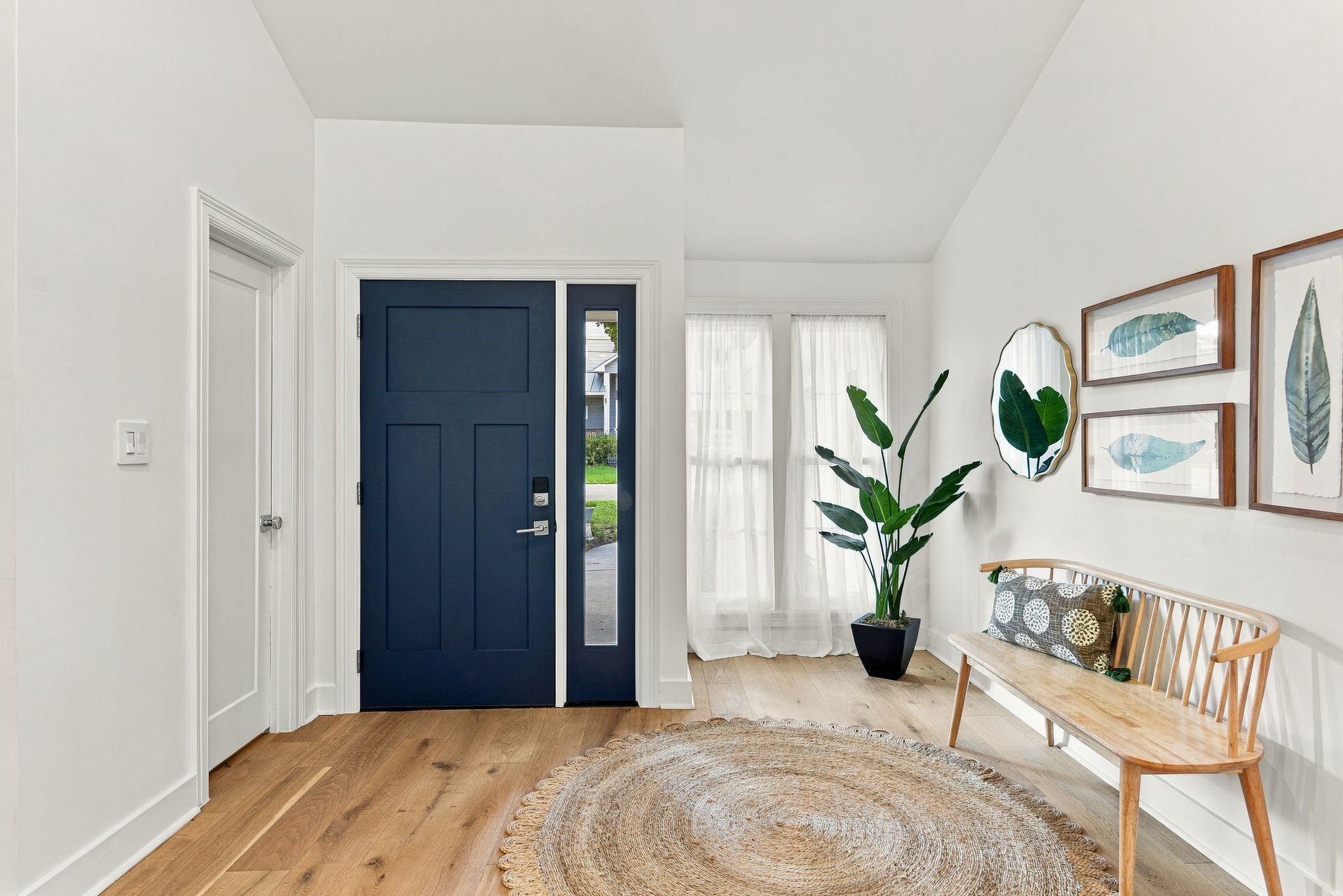 As you enter the home, there is a entry way and half bath.