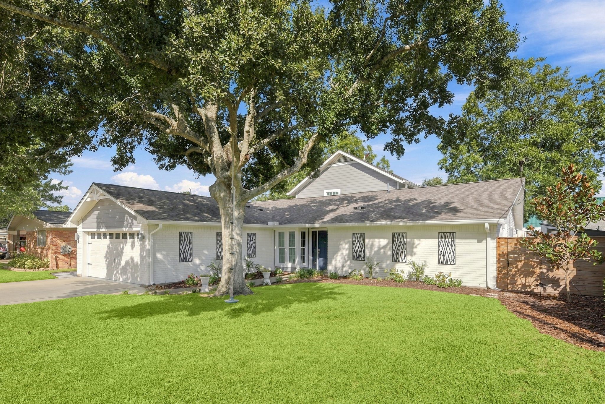 With a nice size yard and mature oak tree.
