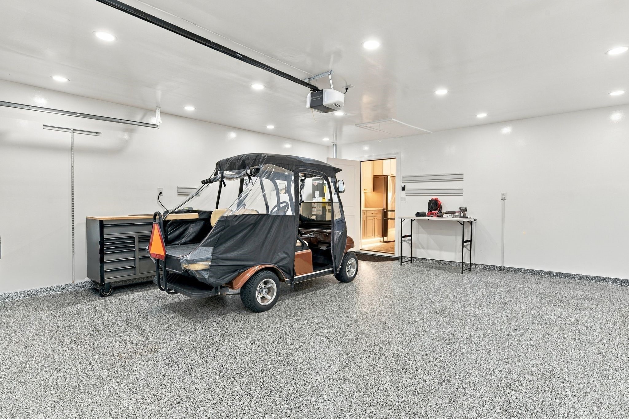 This 1995 Club Car DS also conveys with the home.