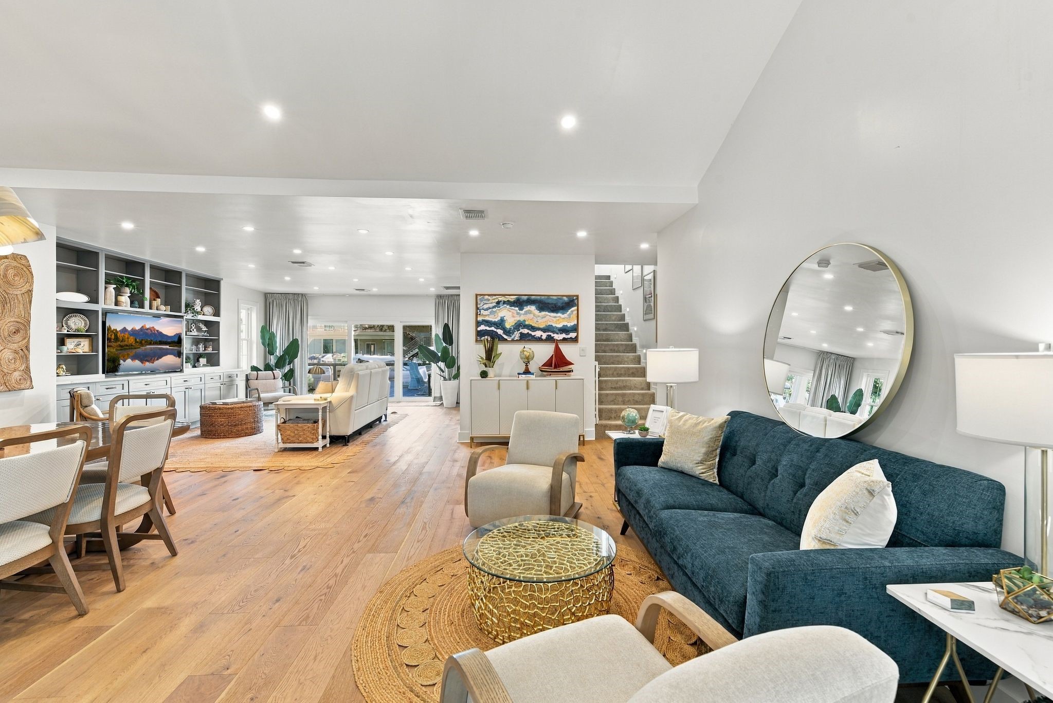 The first floor has an Open Floor concept and leads to the waster.