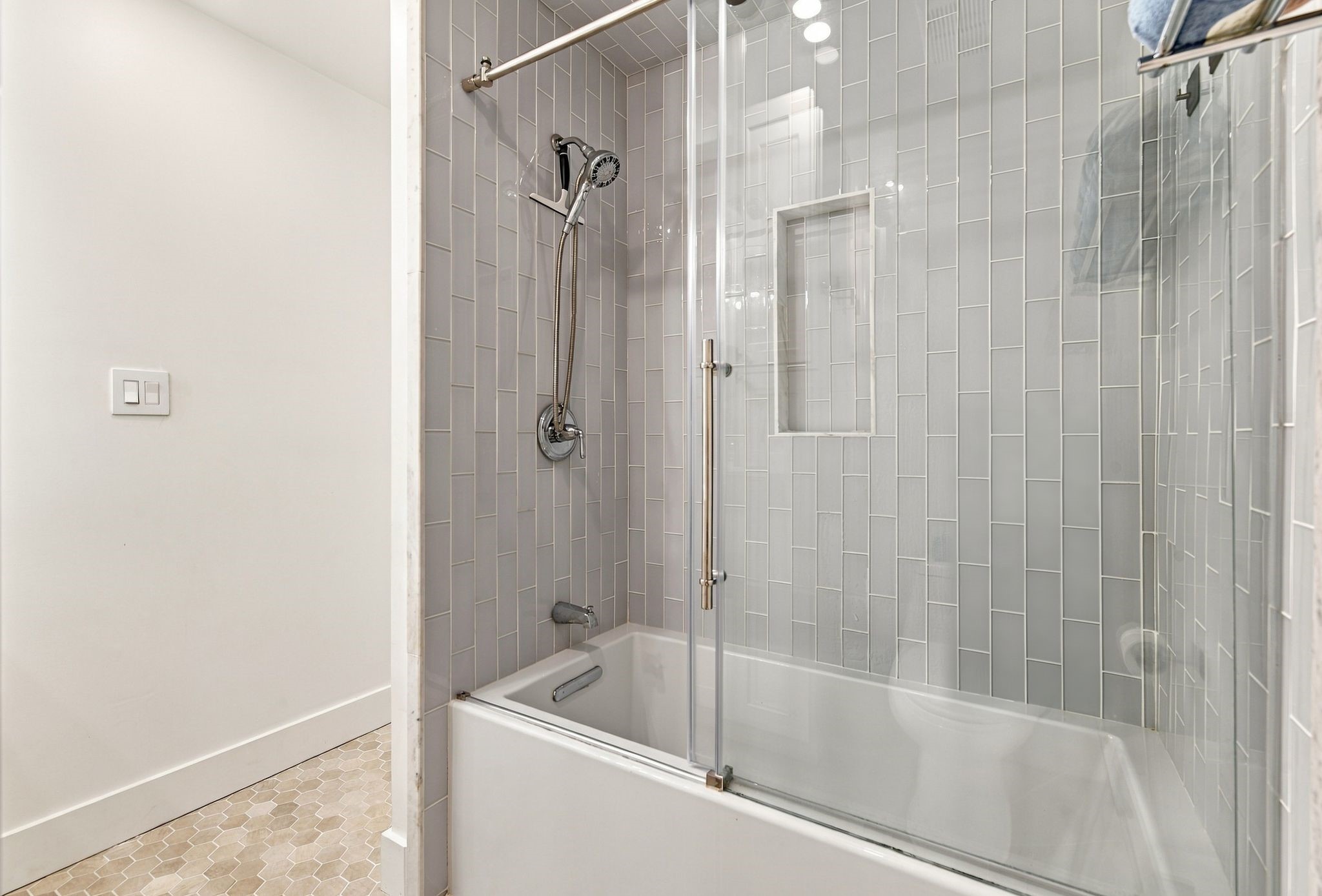 The secondary restroom has a bathtub/shower combo.