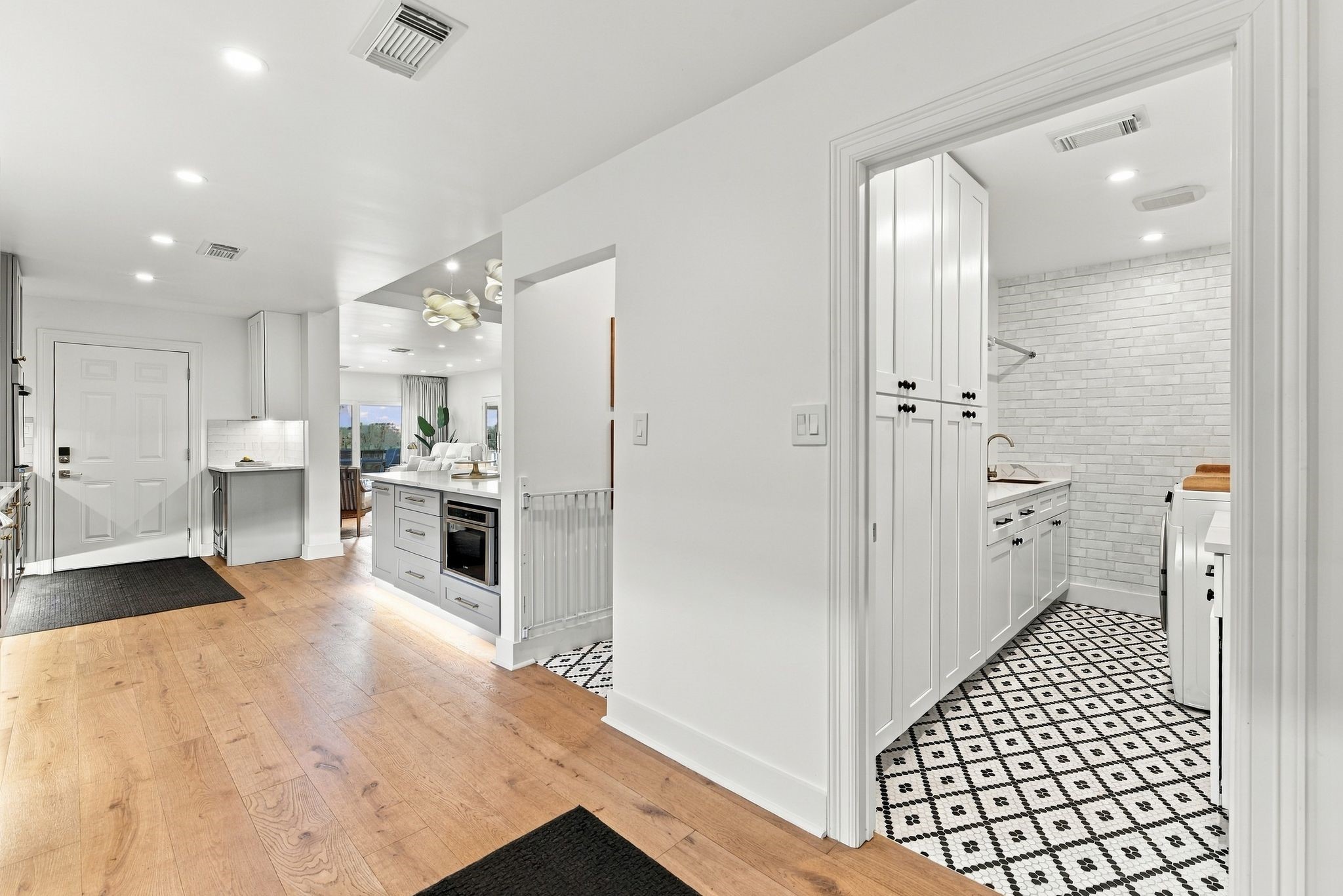 In the kitchen, there is a nice size pantry and laundry room with extra storage.