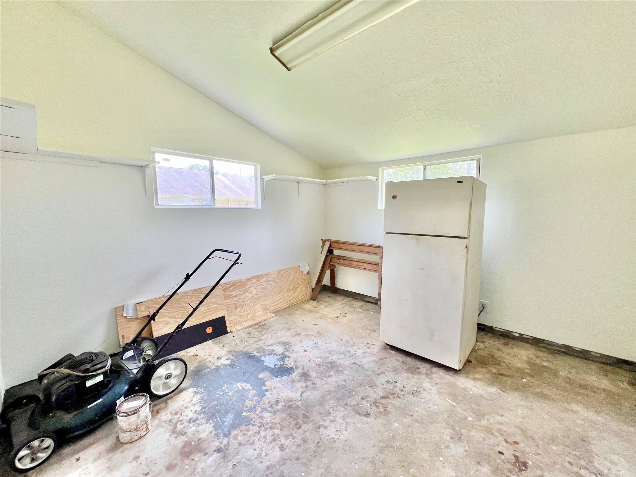 Utility and Storage Room just under the carport
