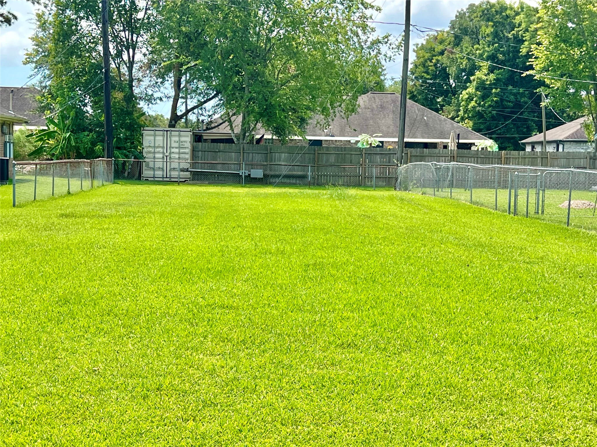 Not only does this home have an oversized fenced back yard, but you also have this entire lot to the left as well!
