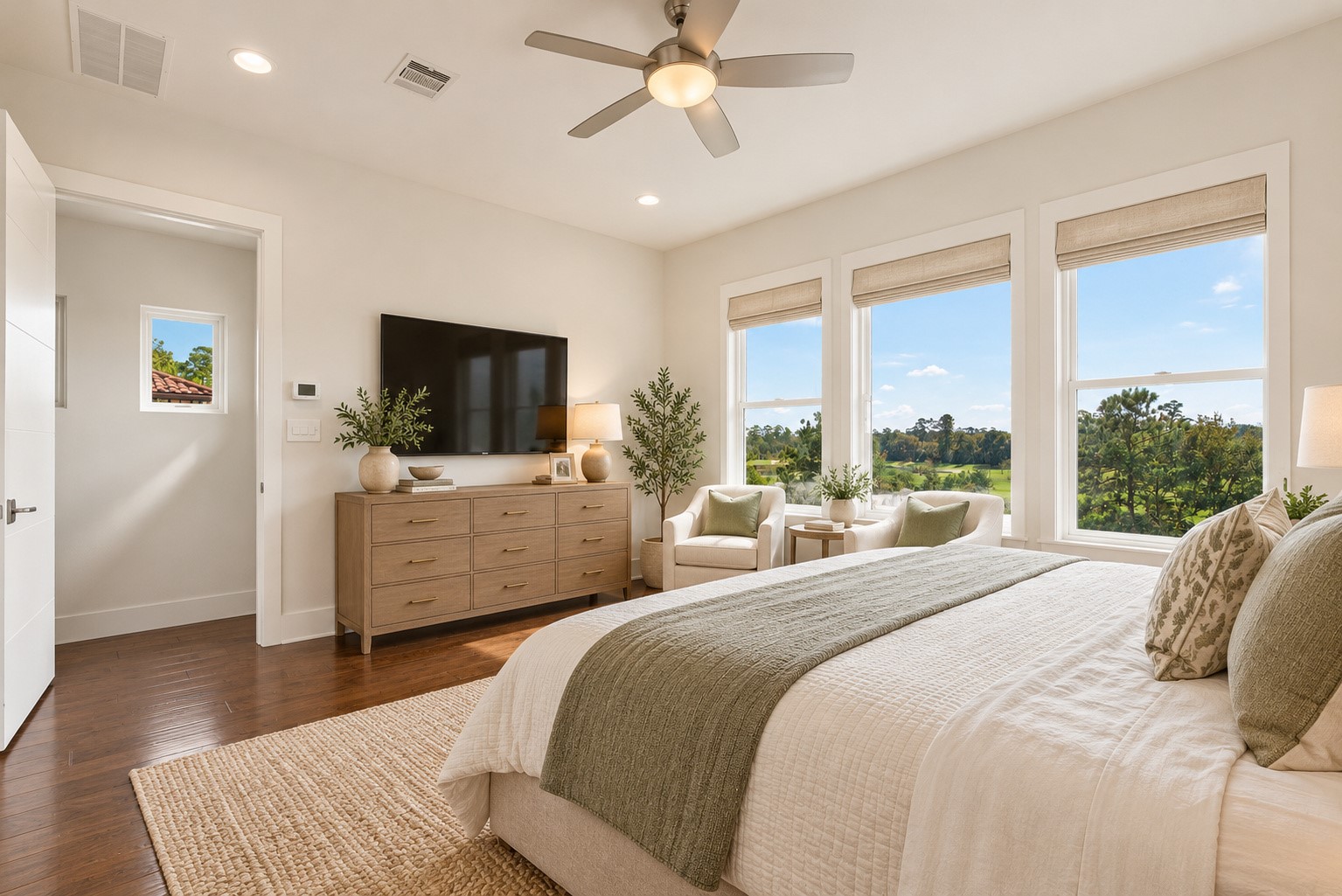 Versatile upstairs retreat with beautiful natural light and a private full bath, ideal for a game room, playroom, home office, or guest suite.