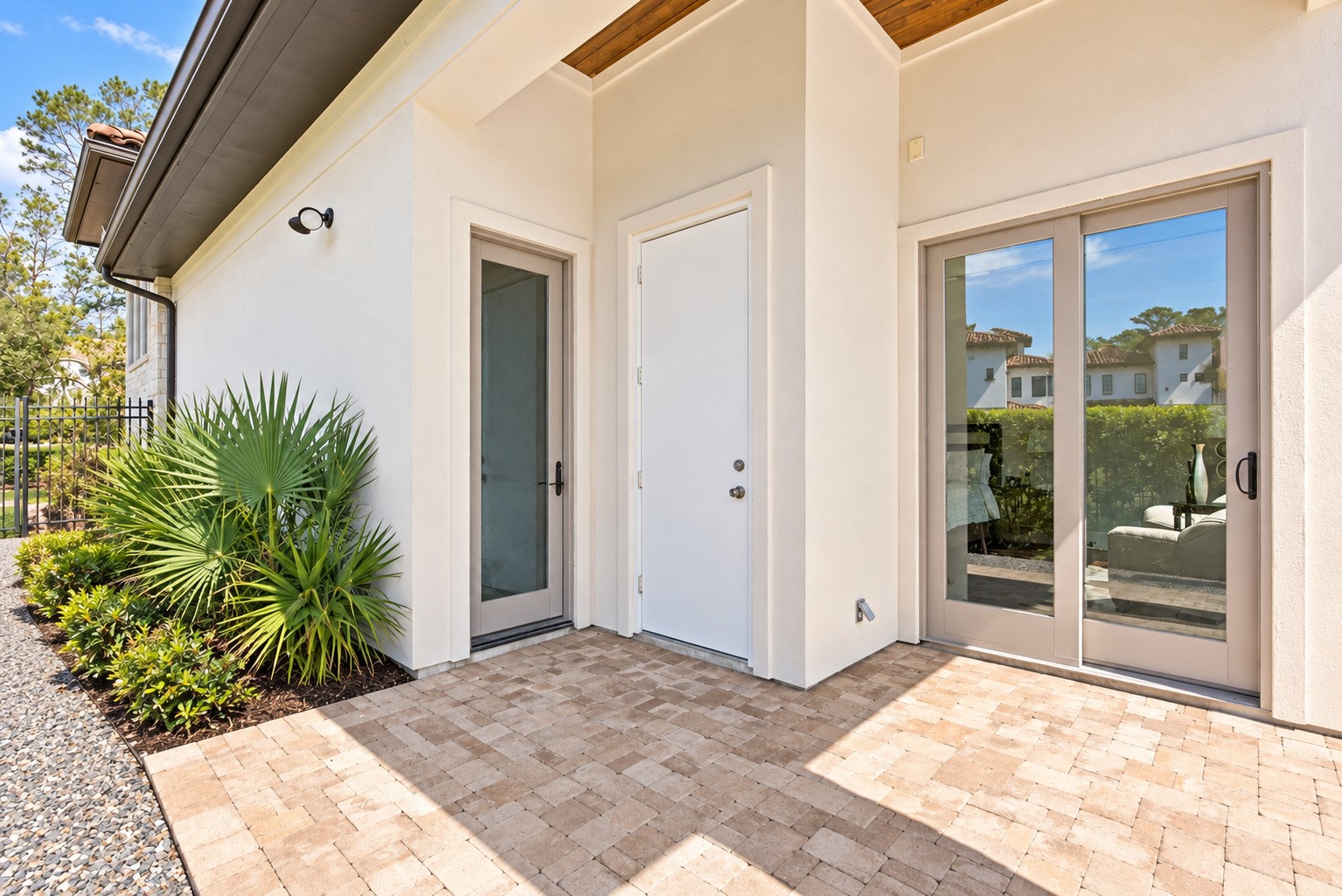 Convenient outdoor half bath located near the primary suite, offering easy access from the pool and patio.