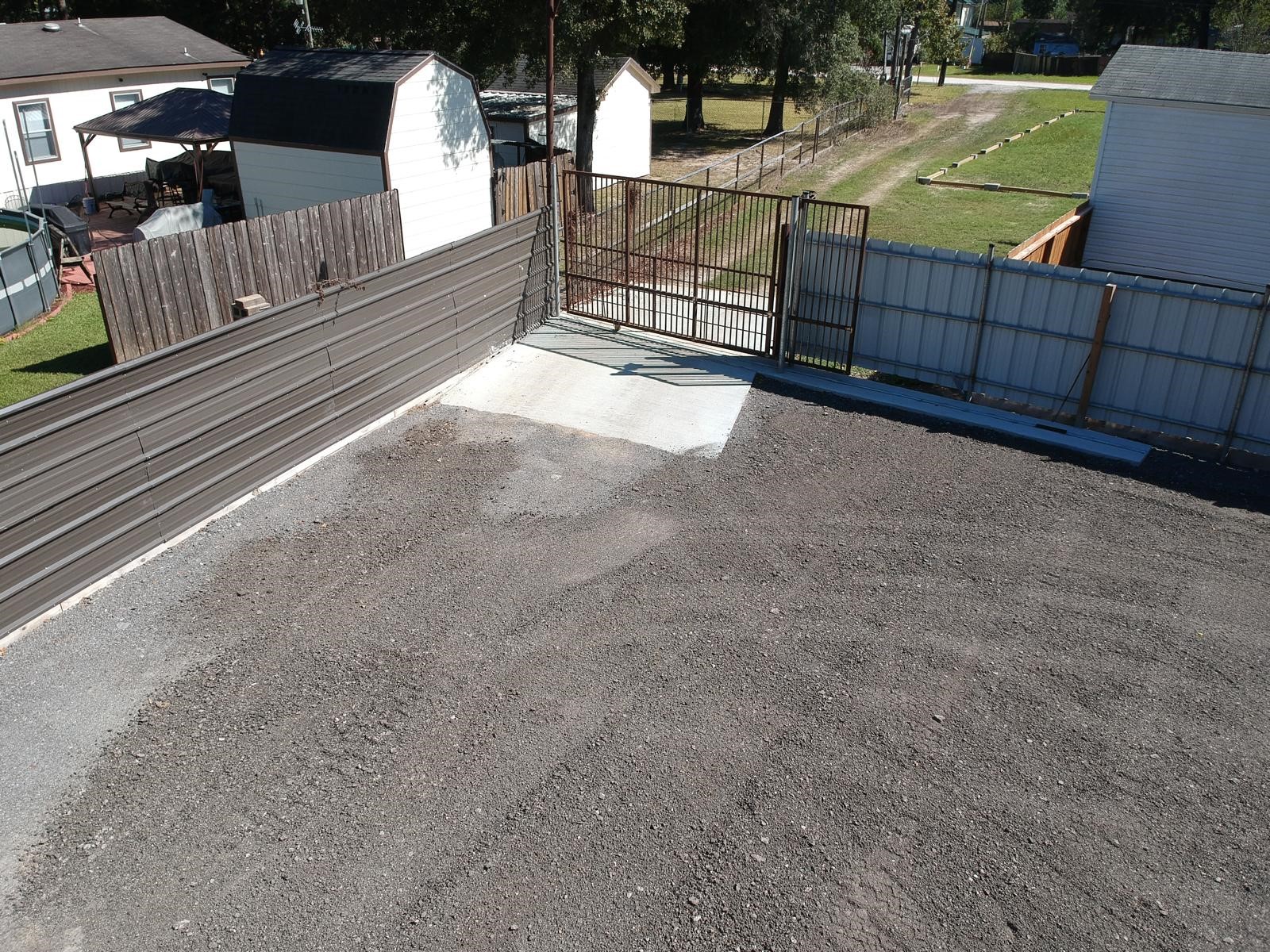 Gated entry to back lot