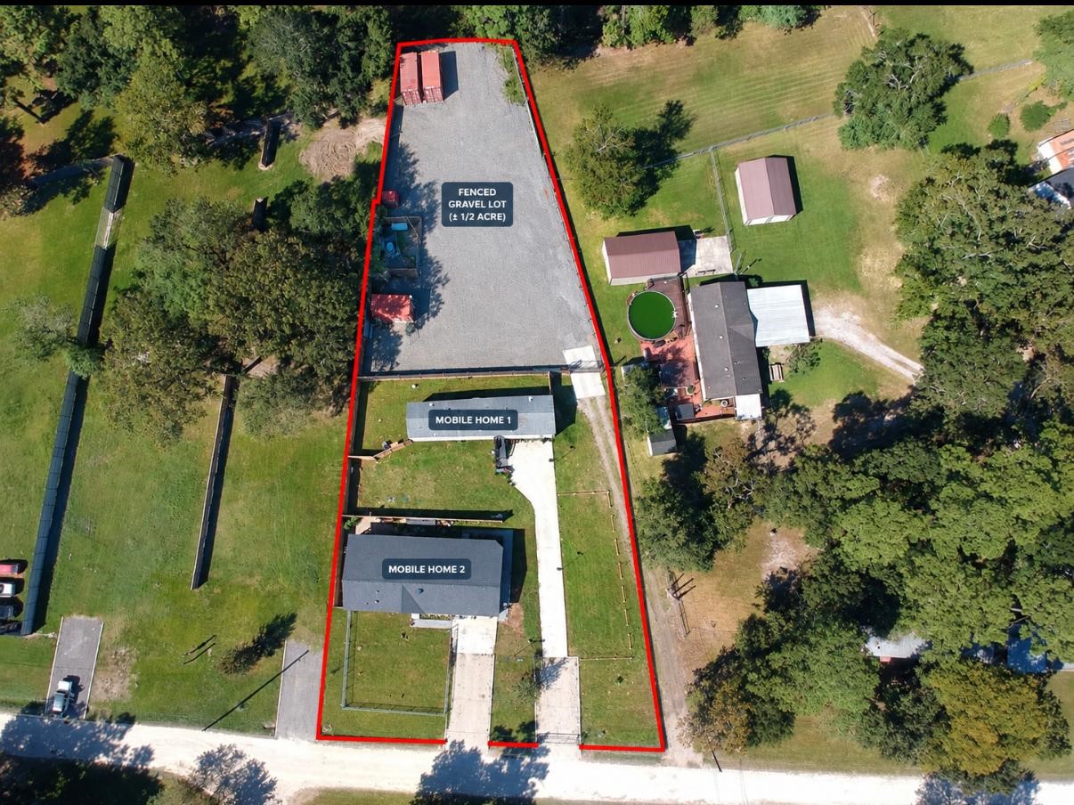 AI outline of property is approximate, gravel access road to back lot is within property lines on survey