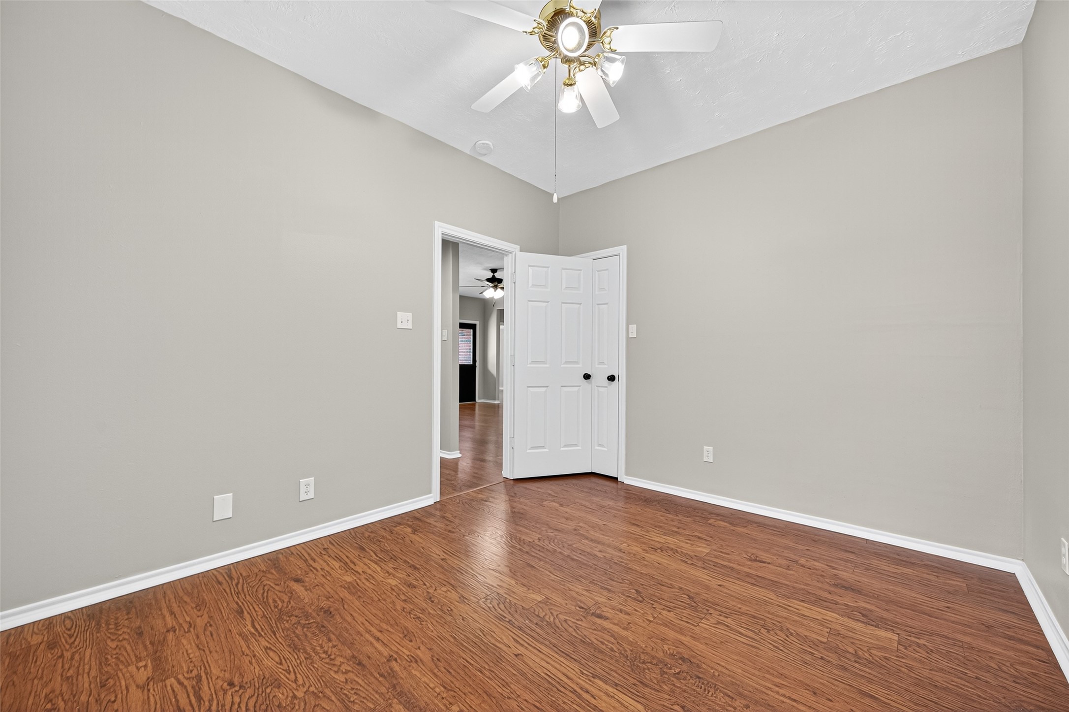 Bedroom 2 - walk-in closet is behind the door