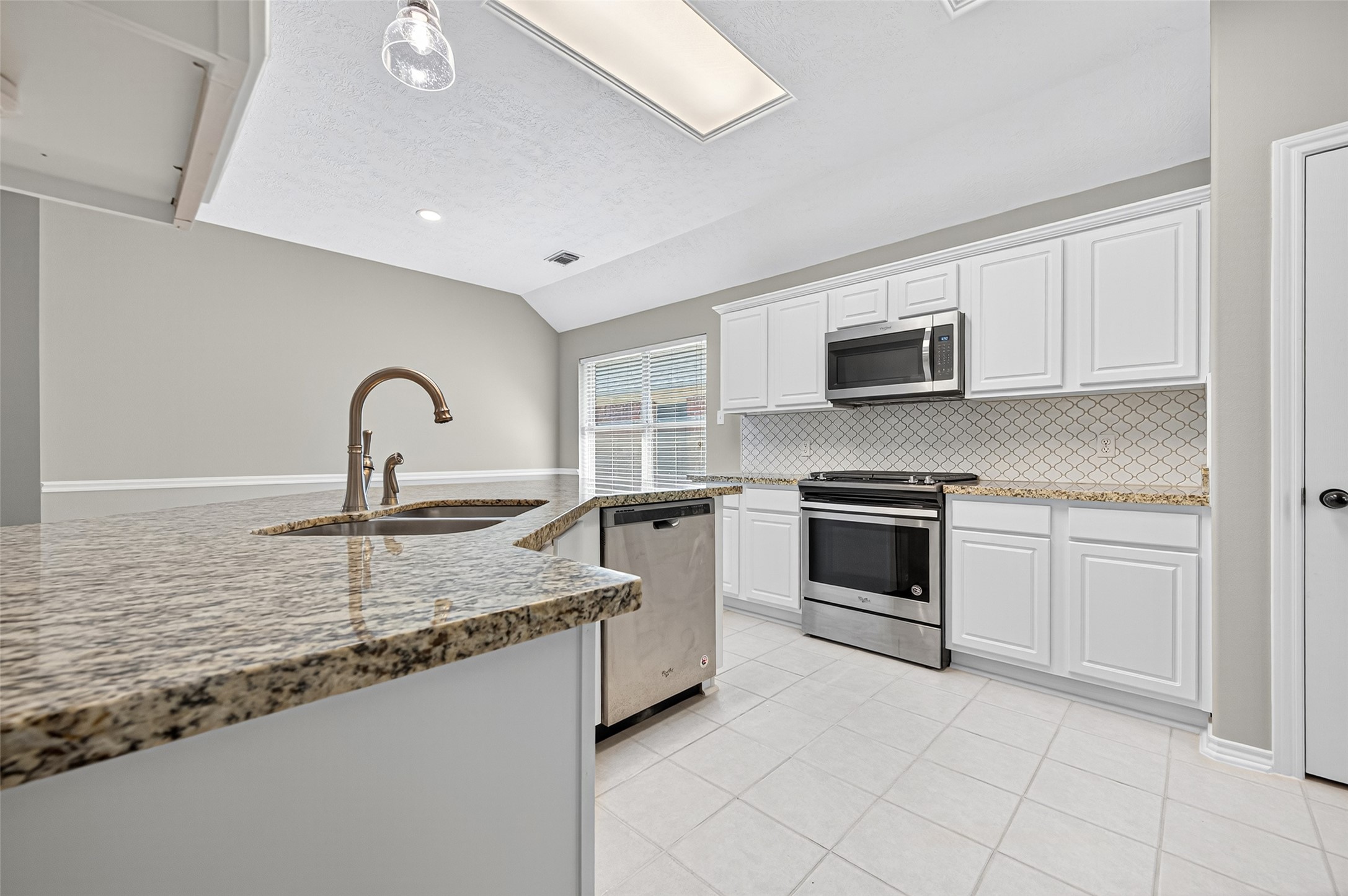 Kitchen off of the Foyer