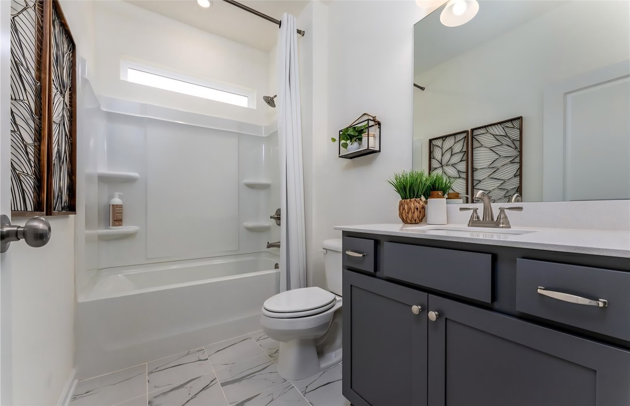 This image is a staged model only to be used for illustration purposes only. Colors and finishes may vary. The listing has white finishes.
