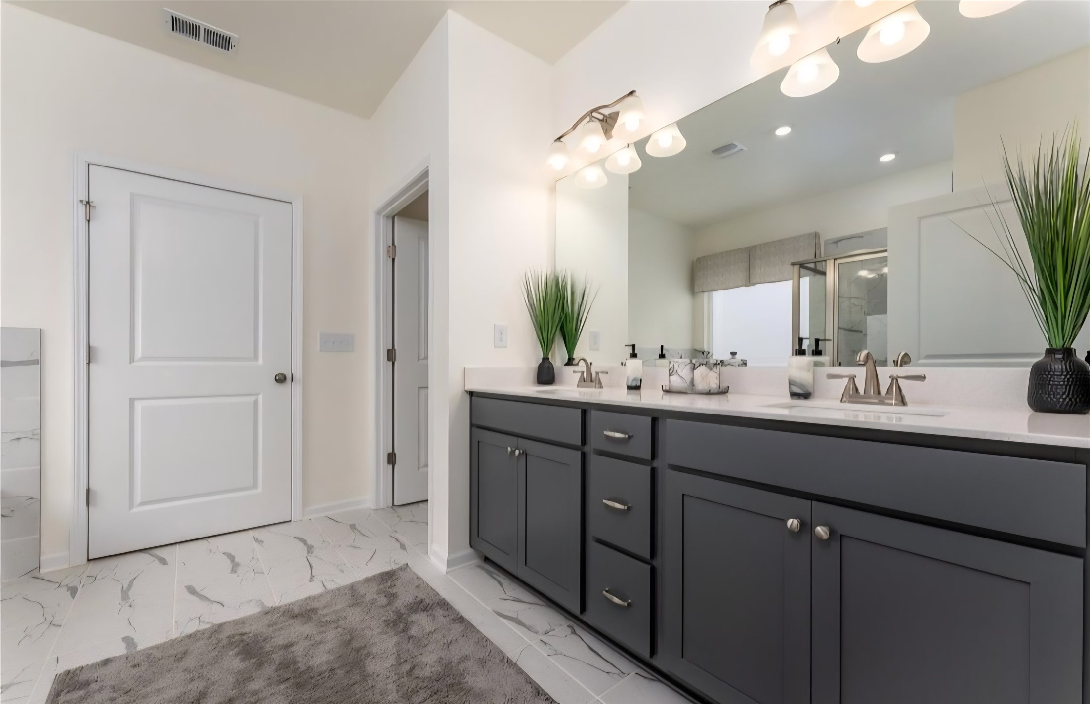 This image is a staged model only to be used for illustration purposes only. Colors and finishes may vary. The listing has white finishes.