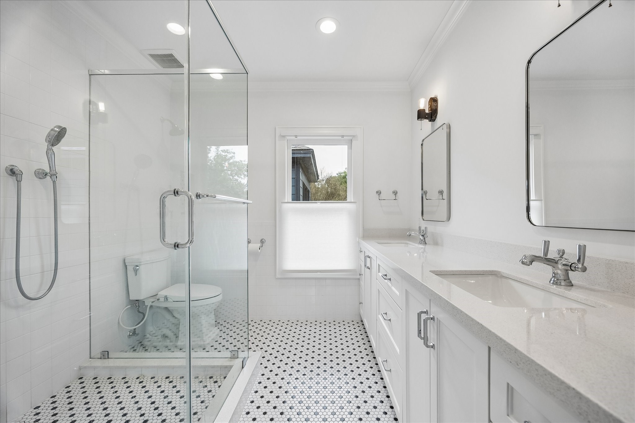 Quartz counters and tiled shower