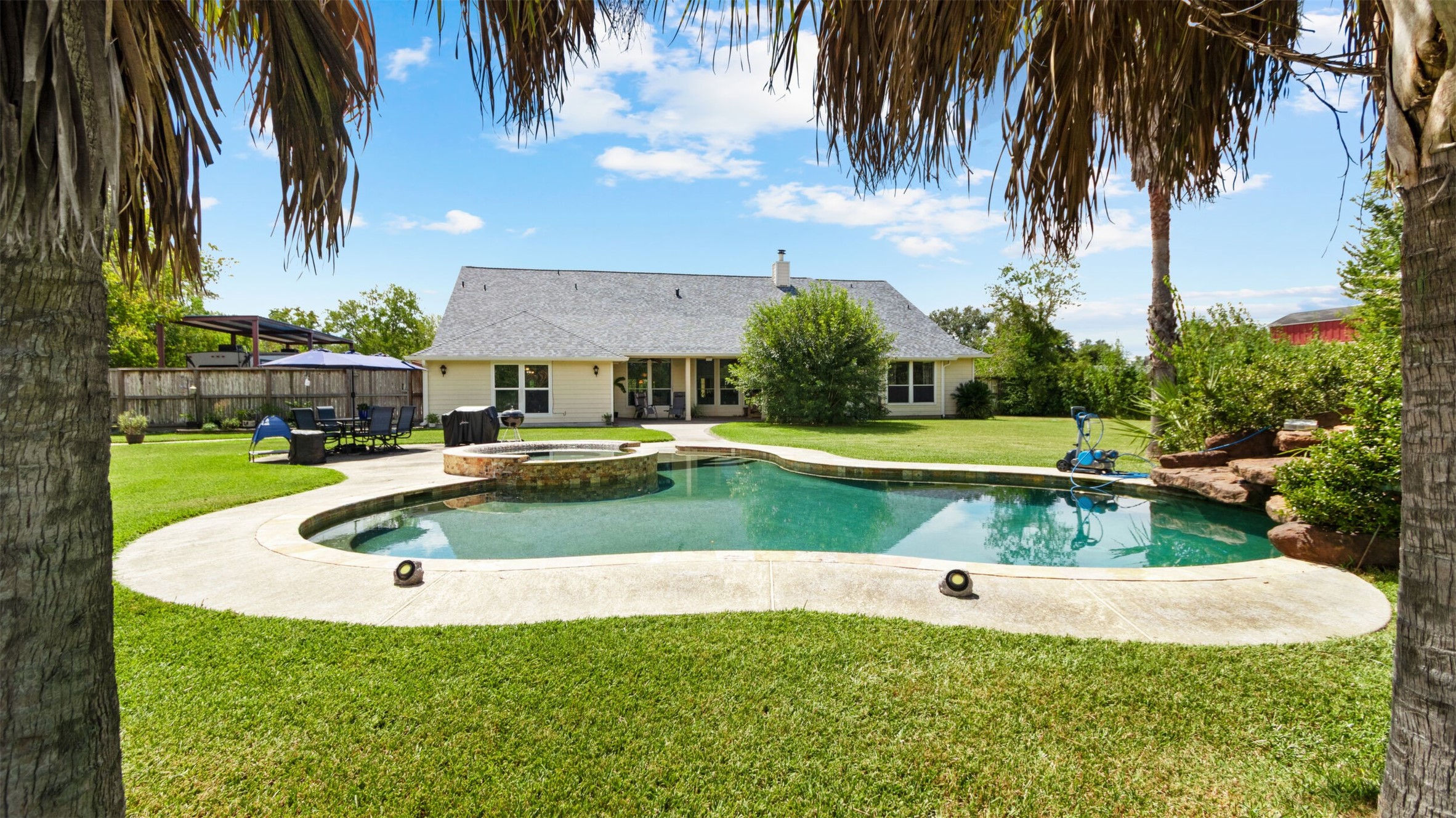 Welcome to your new oasis at 111 County Road 932 in Alvin.
