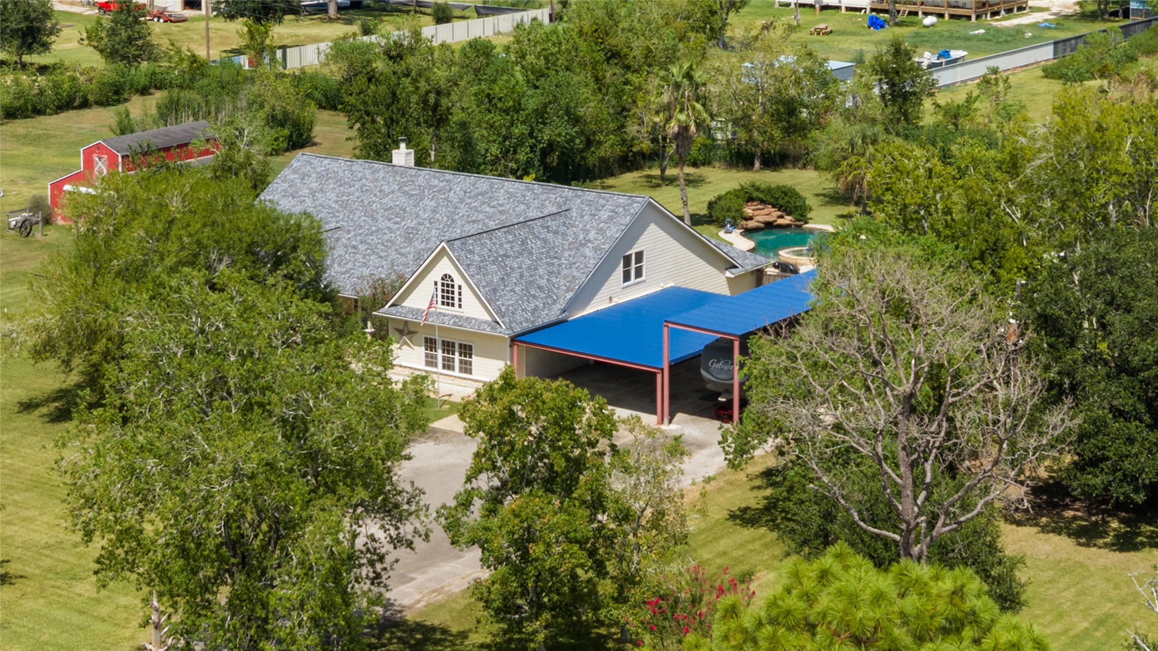 One last look at the home, all that covered parking, and the space that makes this property so easy to love.