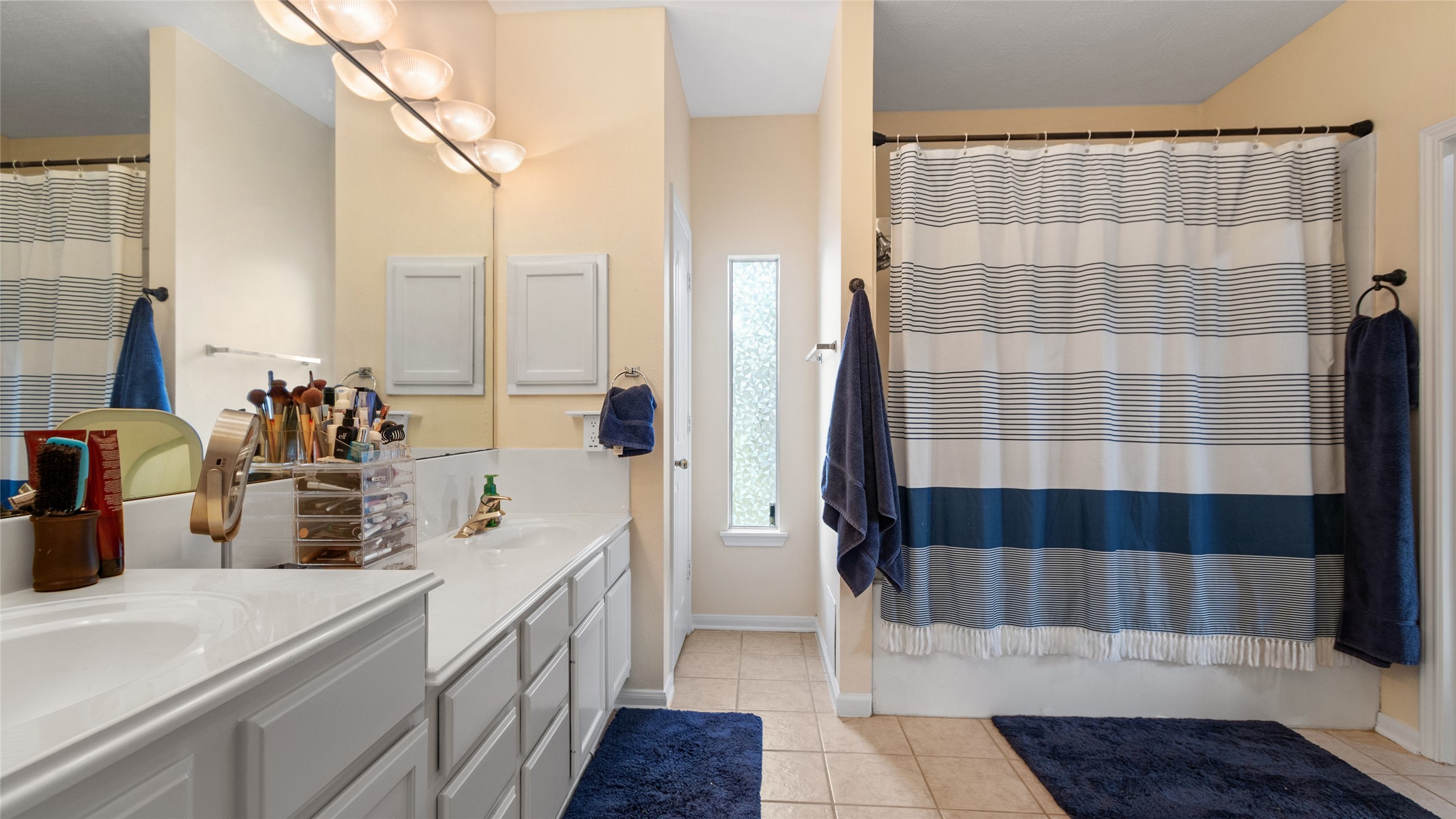 The primary bath also features a jetted tub with shower.