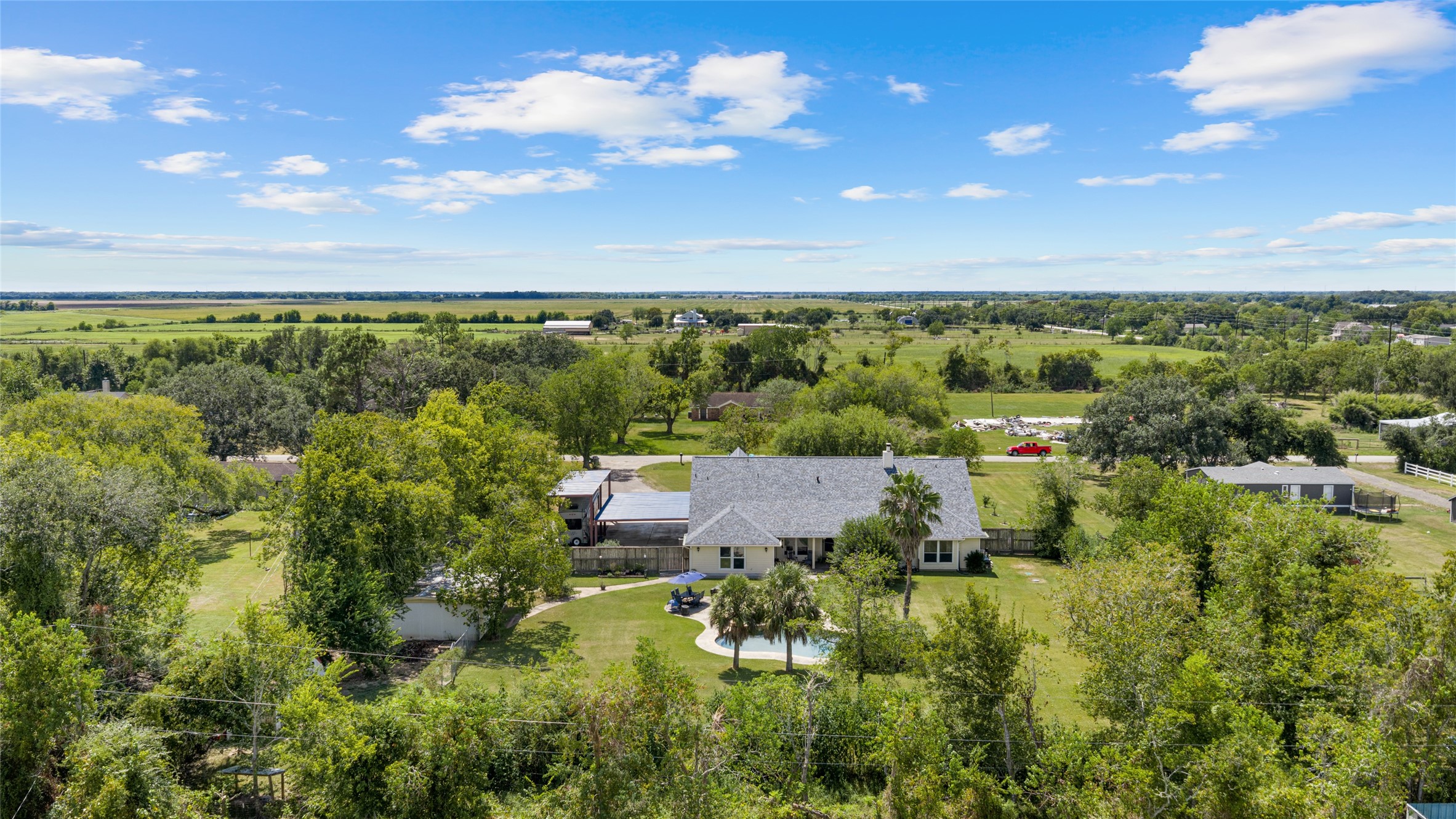 A look from above at the backyard and the full footprint of this spacious property.