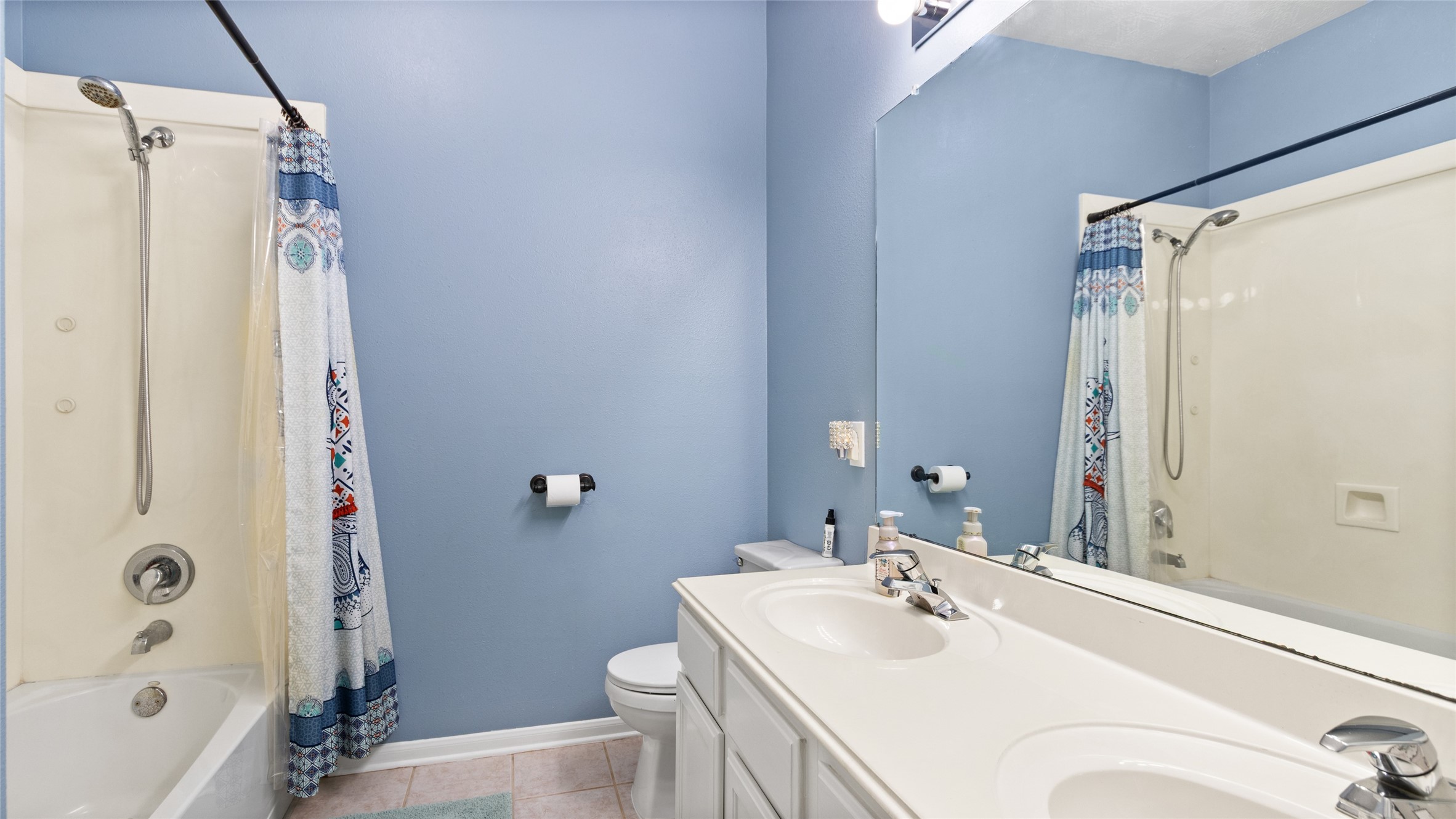 A full guest bathroom conveniently located near the secondary bedrooms.